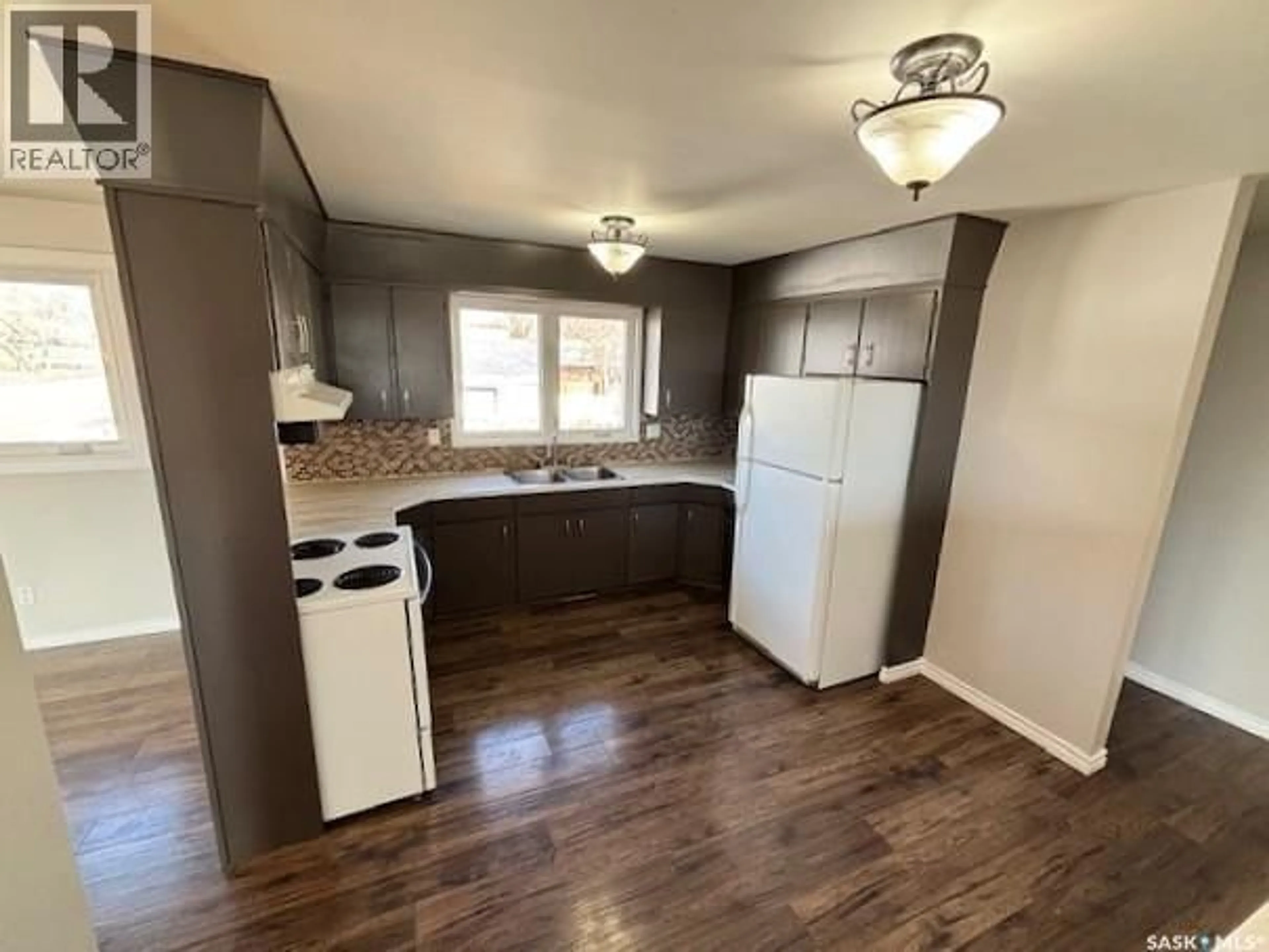 Standard kitchen, wood/laminate floor for 1446 STADACONA STREET, Moose Jaw Saskatchewan S6H6R9