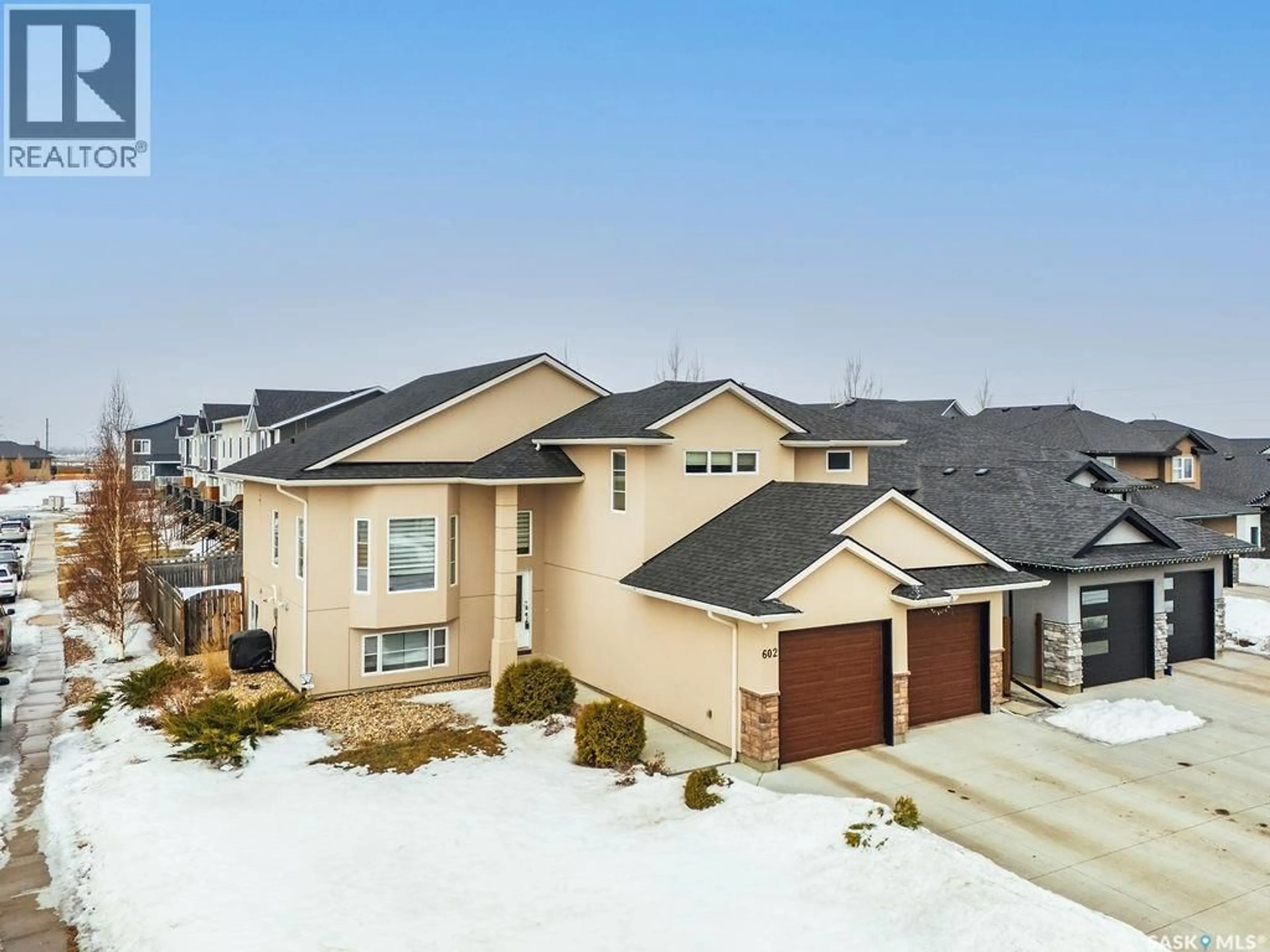 Home with brick exterior material, street for 602 KLOPPENBURG TERRACE, Saskatoon Saskatchewan S7W0P1