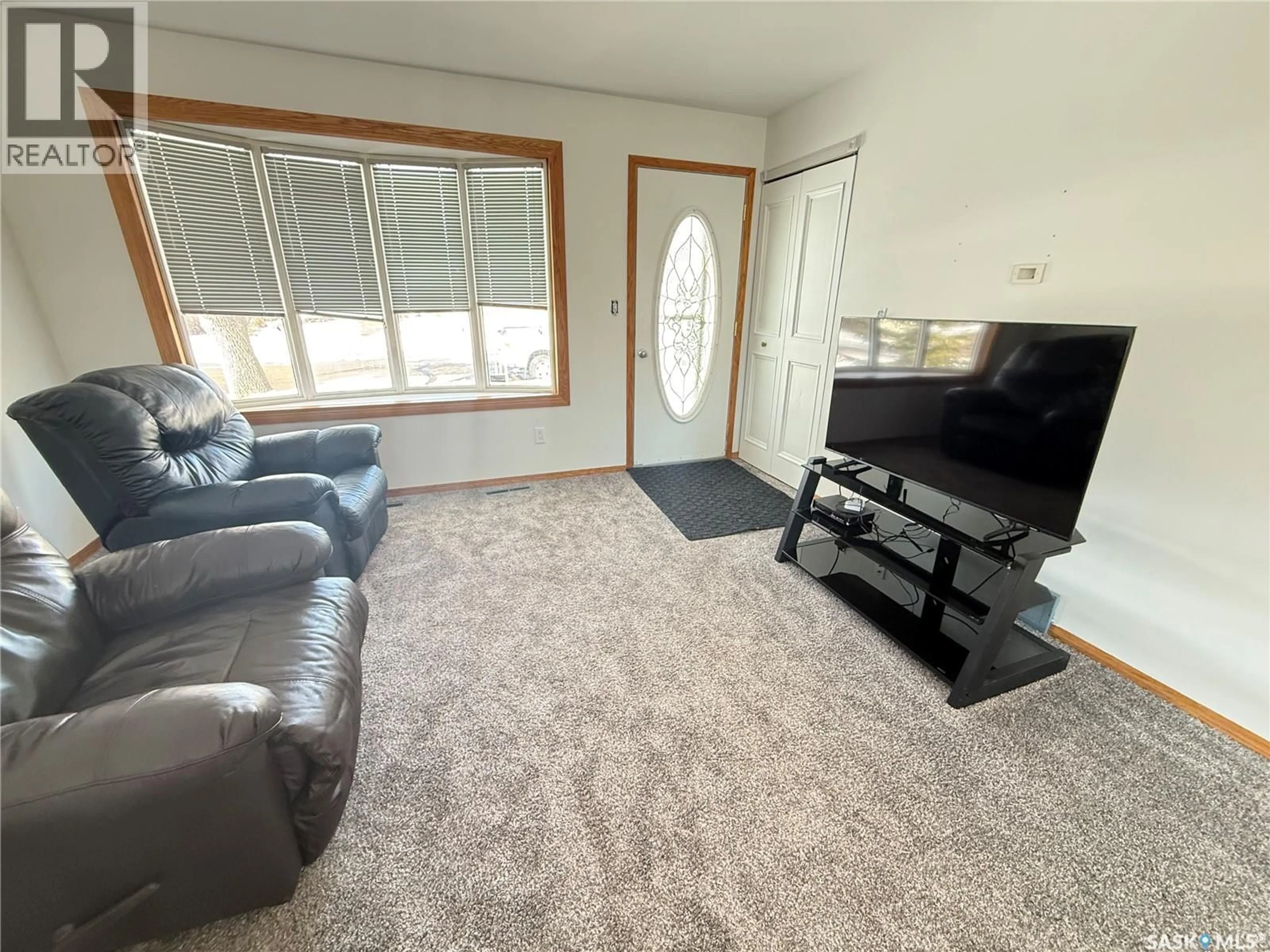 Living room with furniture, unknown for 502 MCLEOD AVENUE, Estevan Saskatchewan S4A0B1