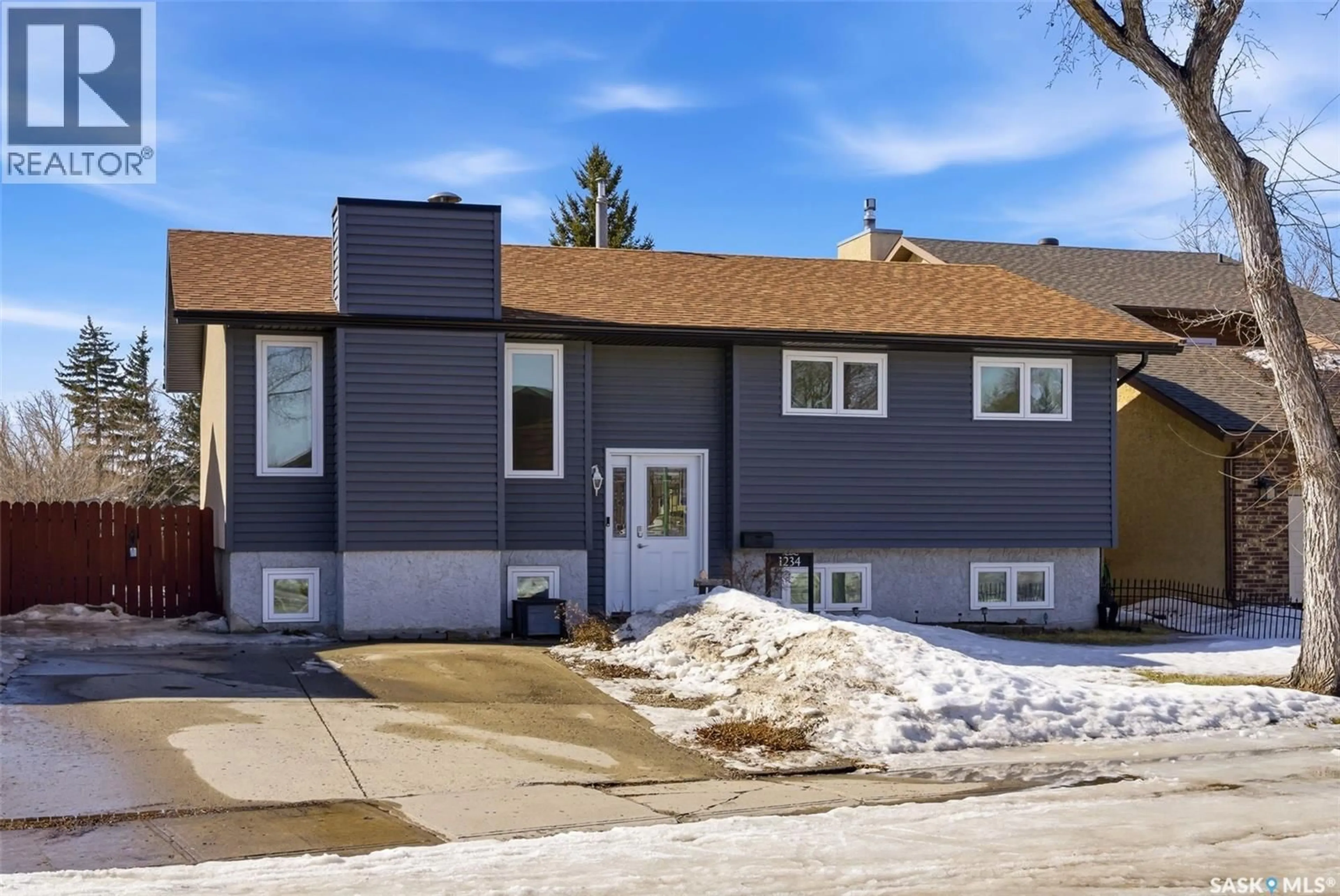 Home with vinyl exterior material, street for 1234 JAMES CRESCENT, Regina Saskatchewan S4N6A5