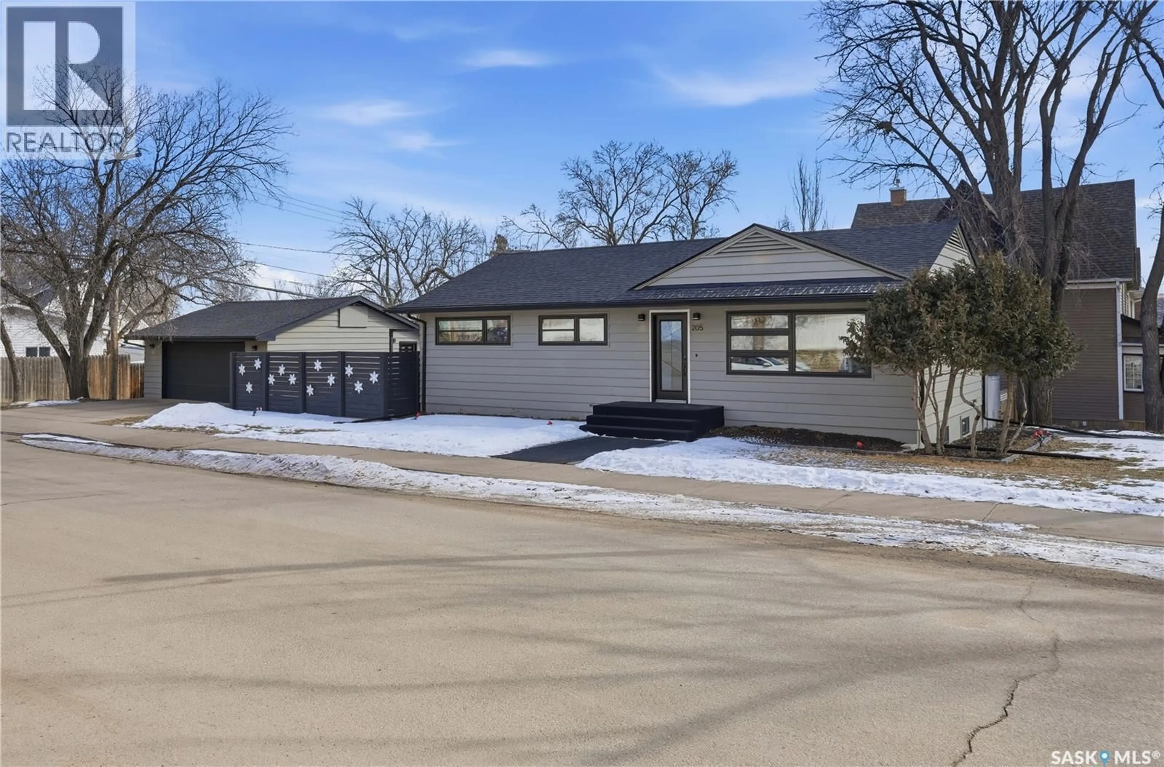 Home with brick exterior material, street for 205 HALL STREET, Moose Jaw Saskatchewan S6H0V1