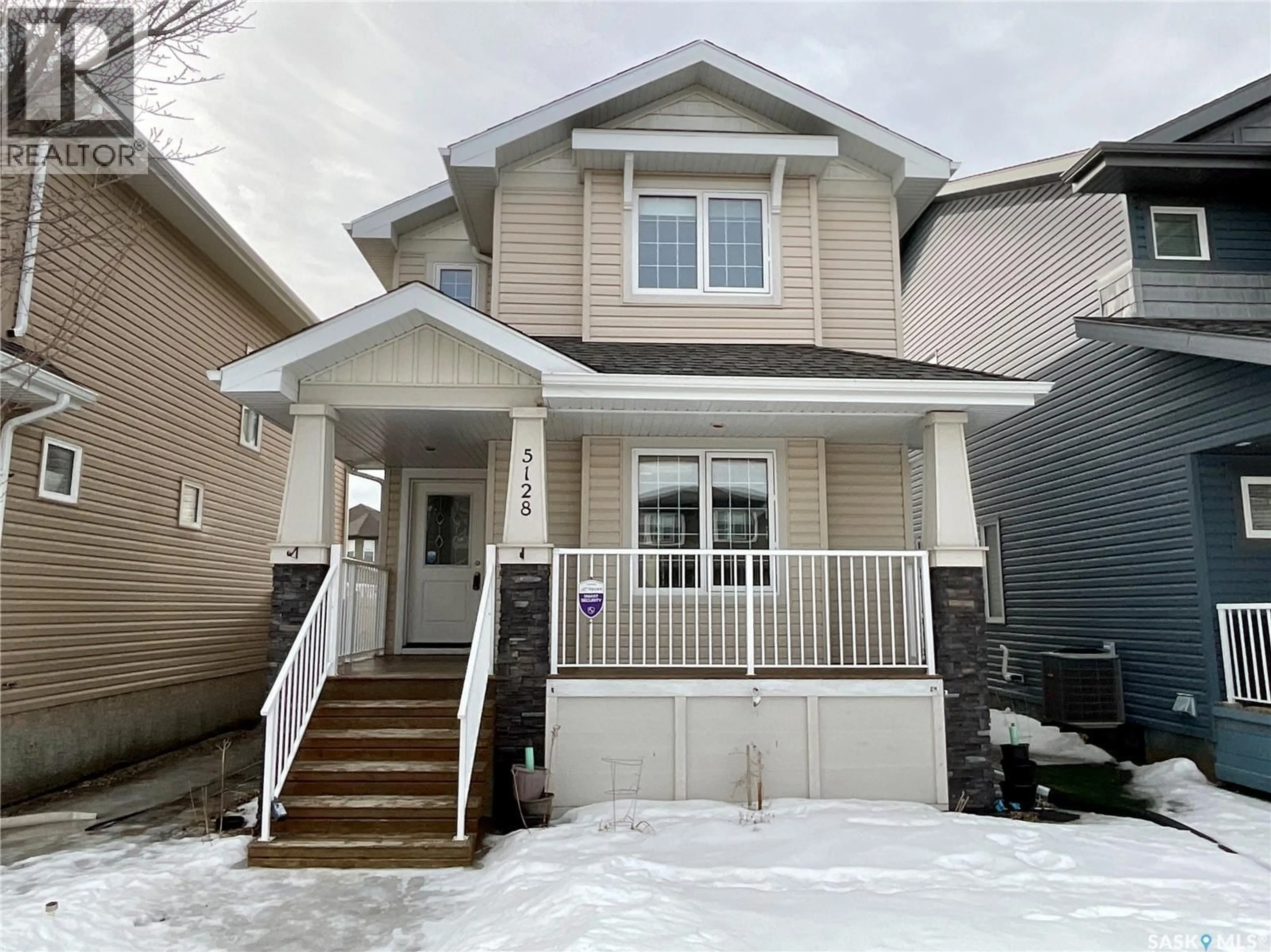 Home with vinyl exterior material, street for 5128 AERIAL CRESCENT, Regina Saskatchewan S4W0C8