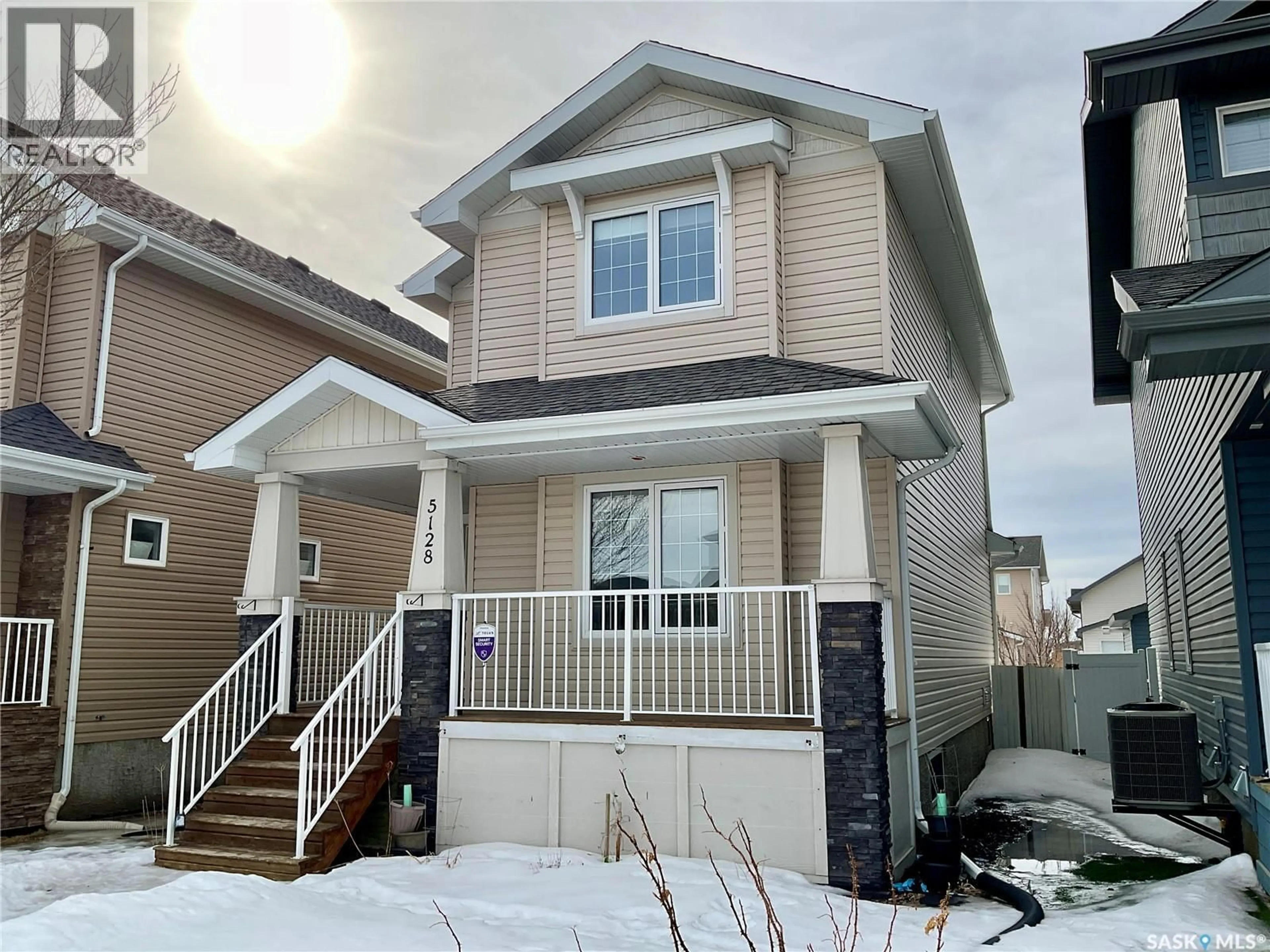Home with vinyl exterior material, street for 5128 AERIAL CRESCENT, Regina Saskatchewan S4W0C8