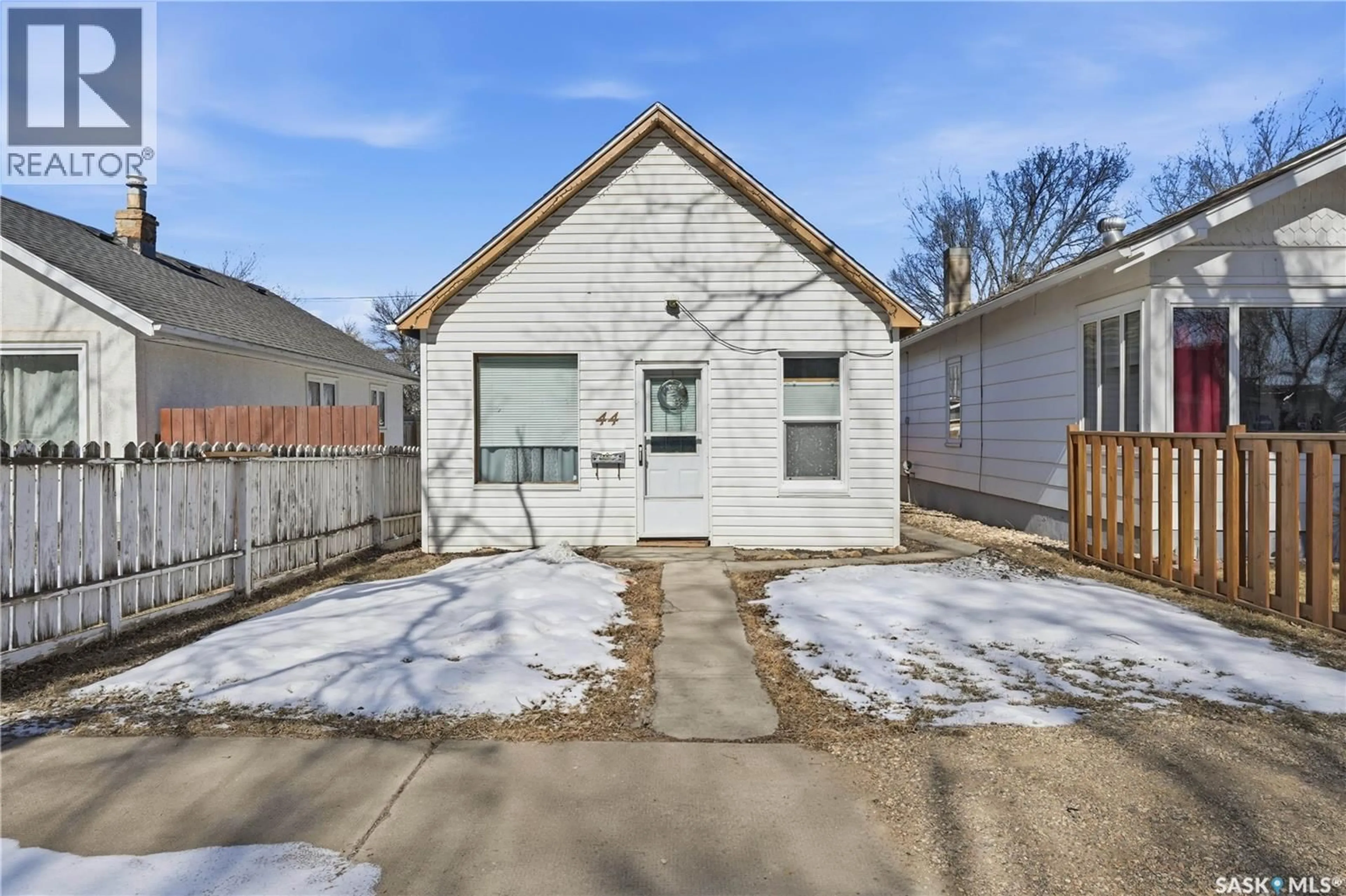 Home with brick exterior material, street for 44 LILLOOET STREET, Moose Jaw Saskatchewan S6H4Y5