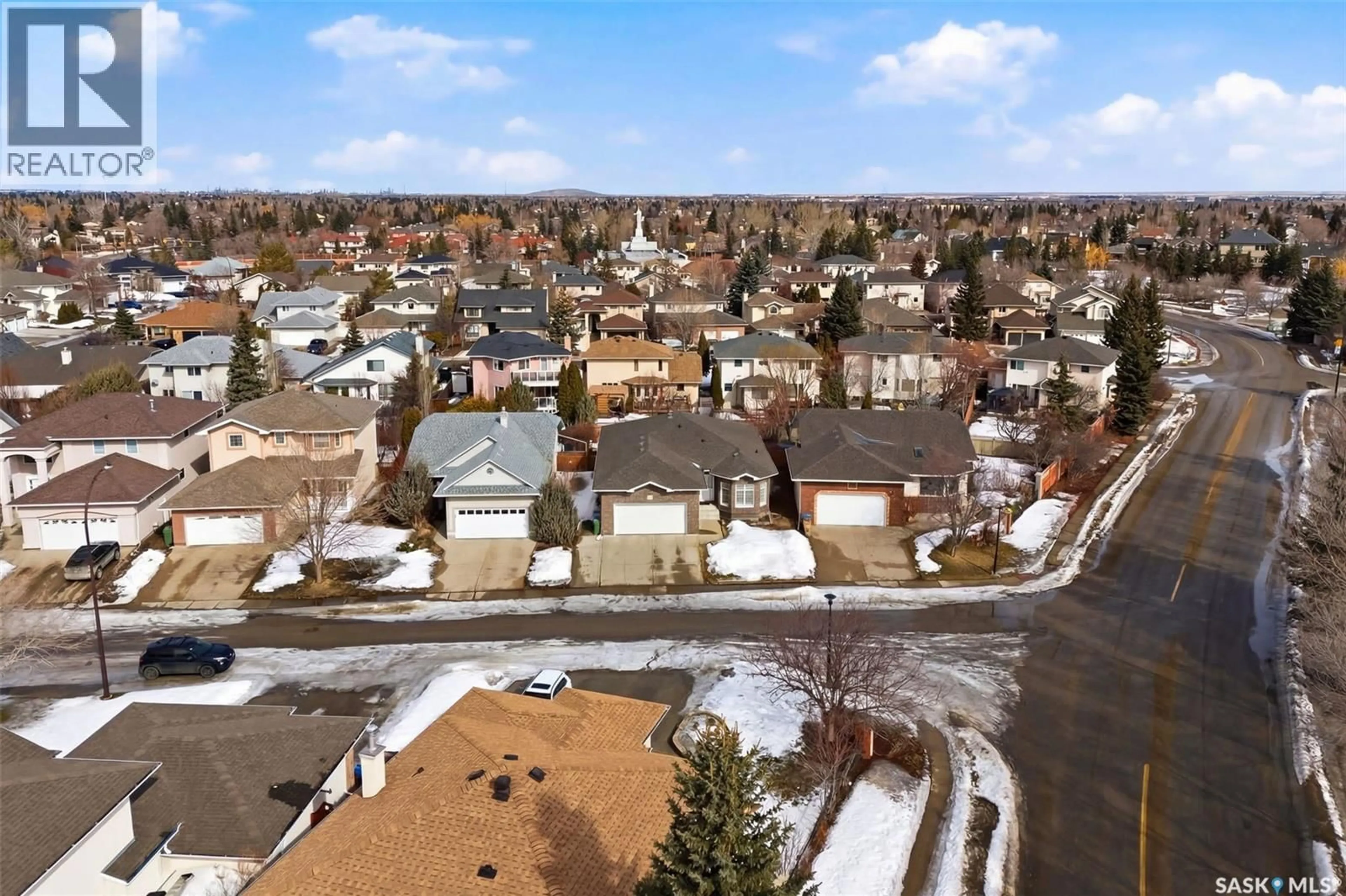 A pic from outside/outdoor area/front of a property/back of a property/a pic from drone, street for 11192 WASCANA MEADOWS, Regina Saskatchewan S4V2W2