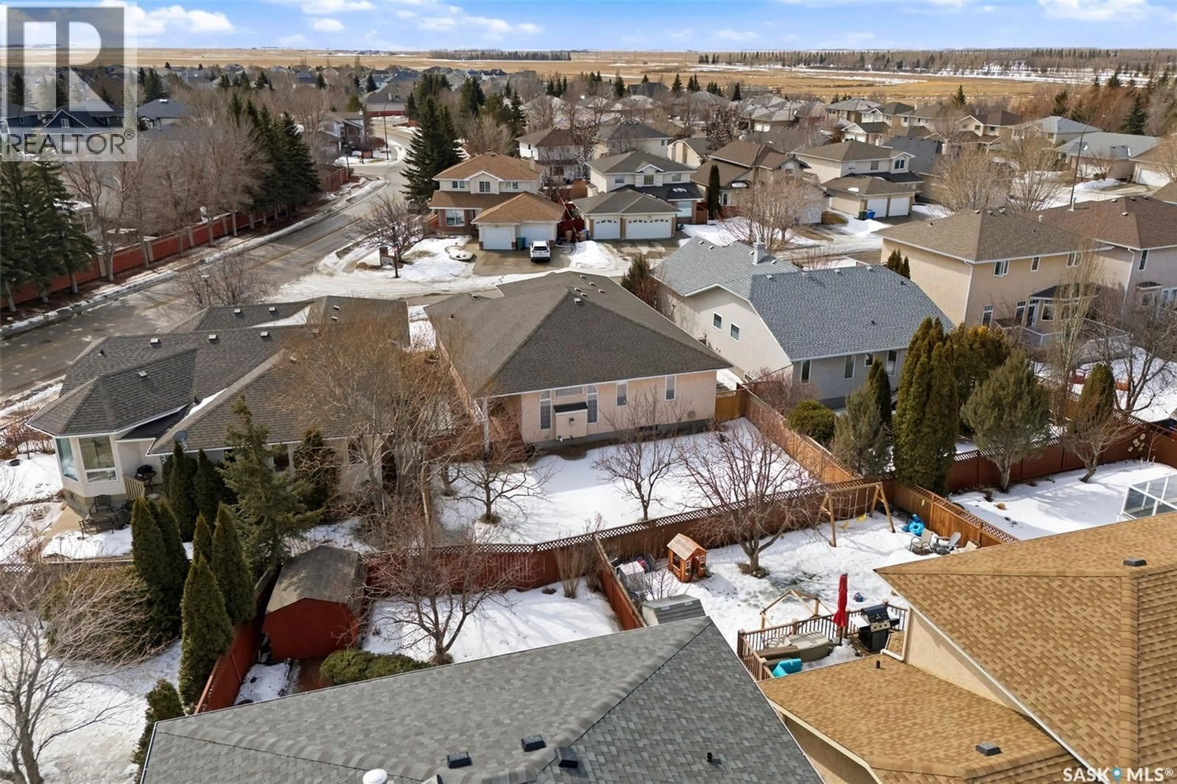 A pic from outside/outdoor area/front of a property/back of a property/a pic from drone, mountain view for 11192 WASCANA MEADOWS, Regina Saskatchewan S4V2W2