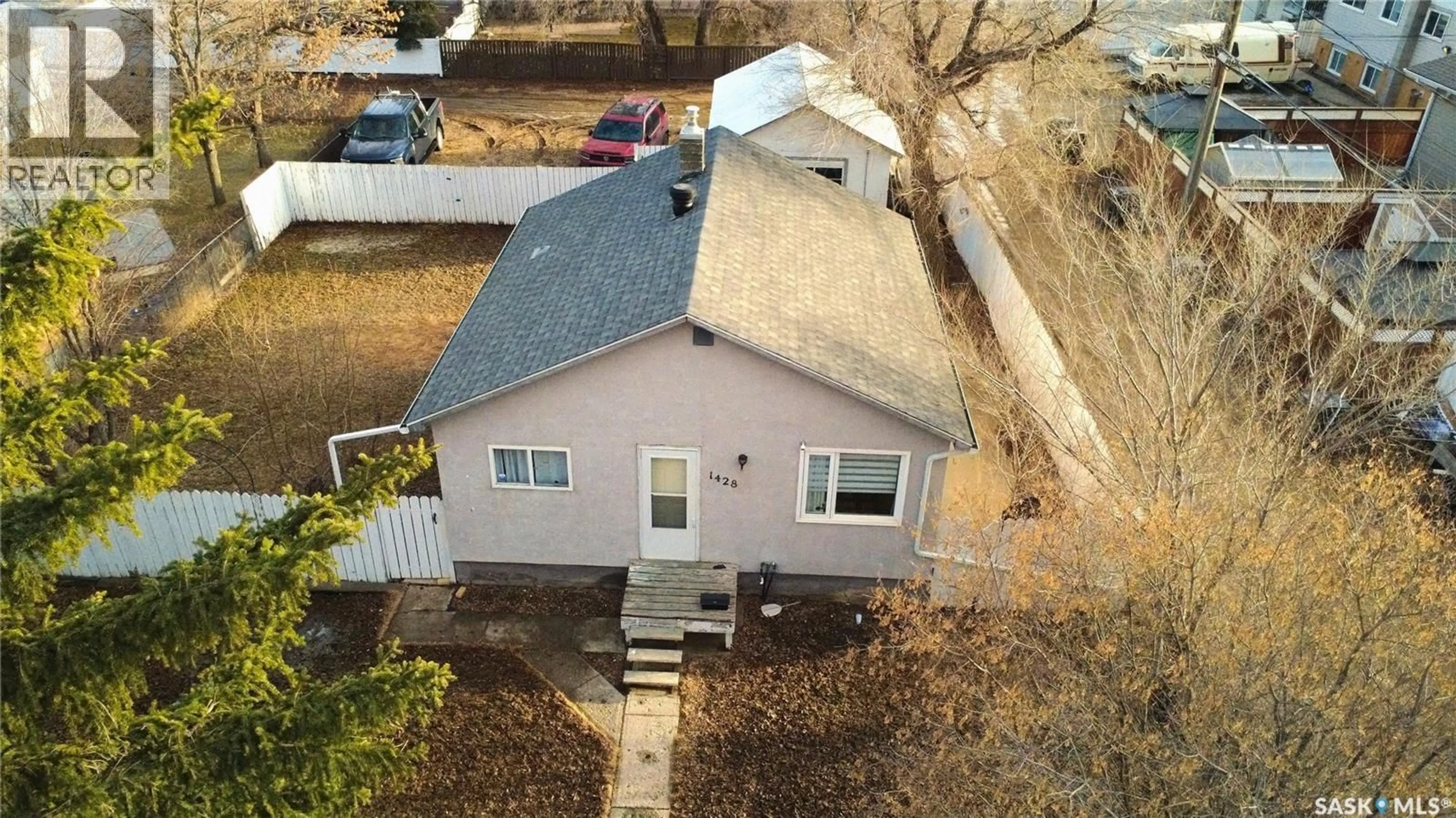 A pic from outside/outdoor area/front of a property/back of a property/a pic from drone, building for 1428 WINNIE STREET, Swift Current Saskatchewan S9H1R3