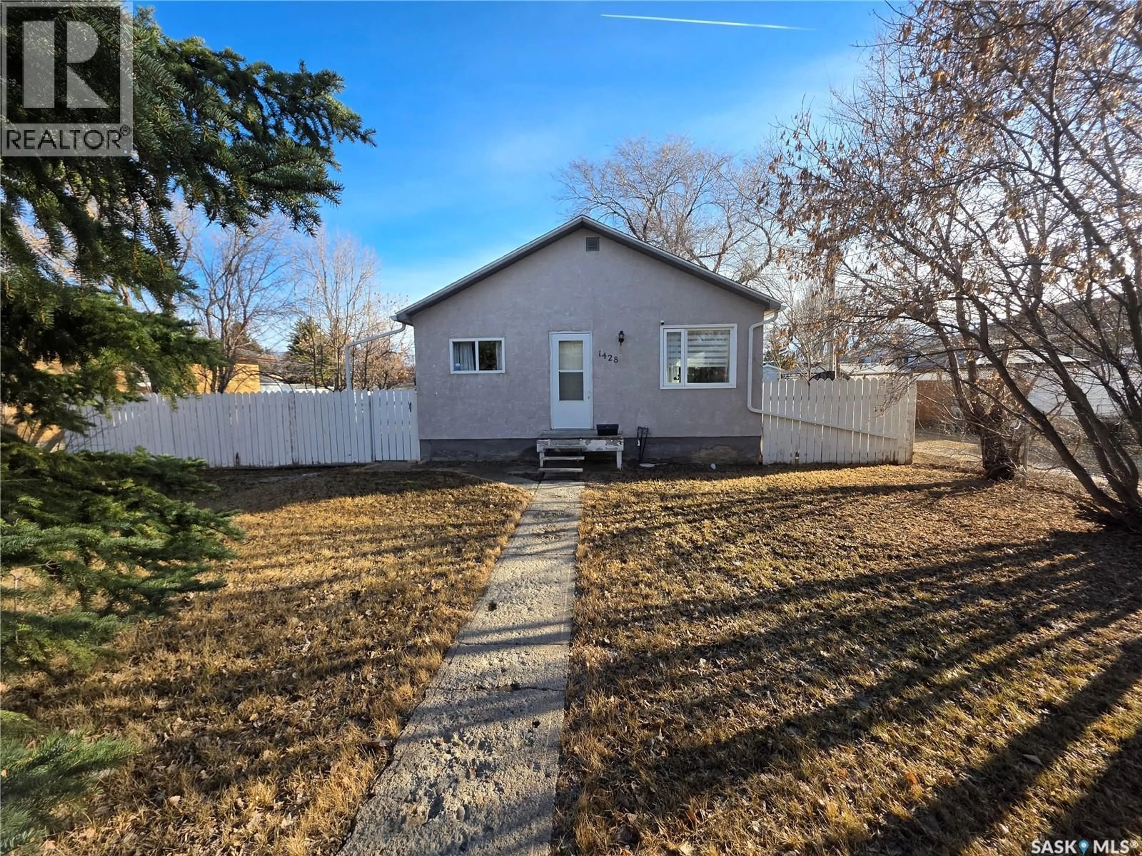 A pic from outside/outdoor area/front of a property/back of a property/a pic from drone, street for 1428 WINNIE STREET, Swift Current Saskatchewan S9H1R3