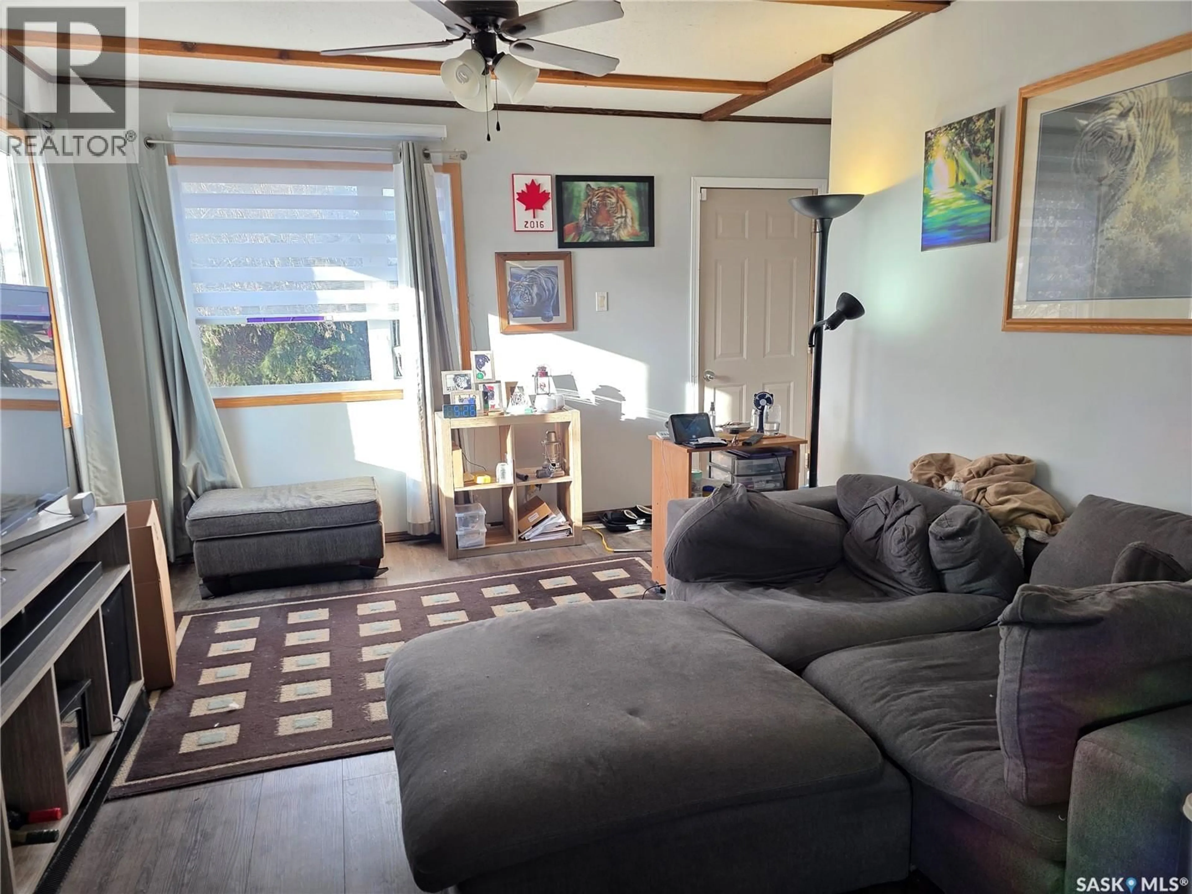 Living room with furniture, unknown for 1428 WINNIE STREET, Swift Current Saskatchewan S9H1R3