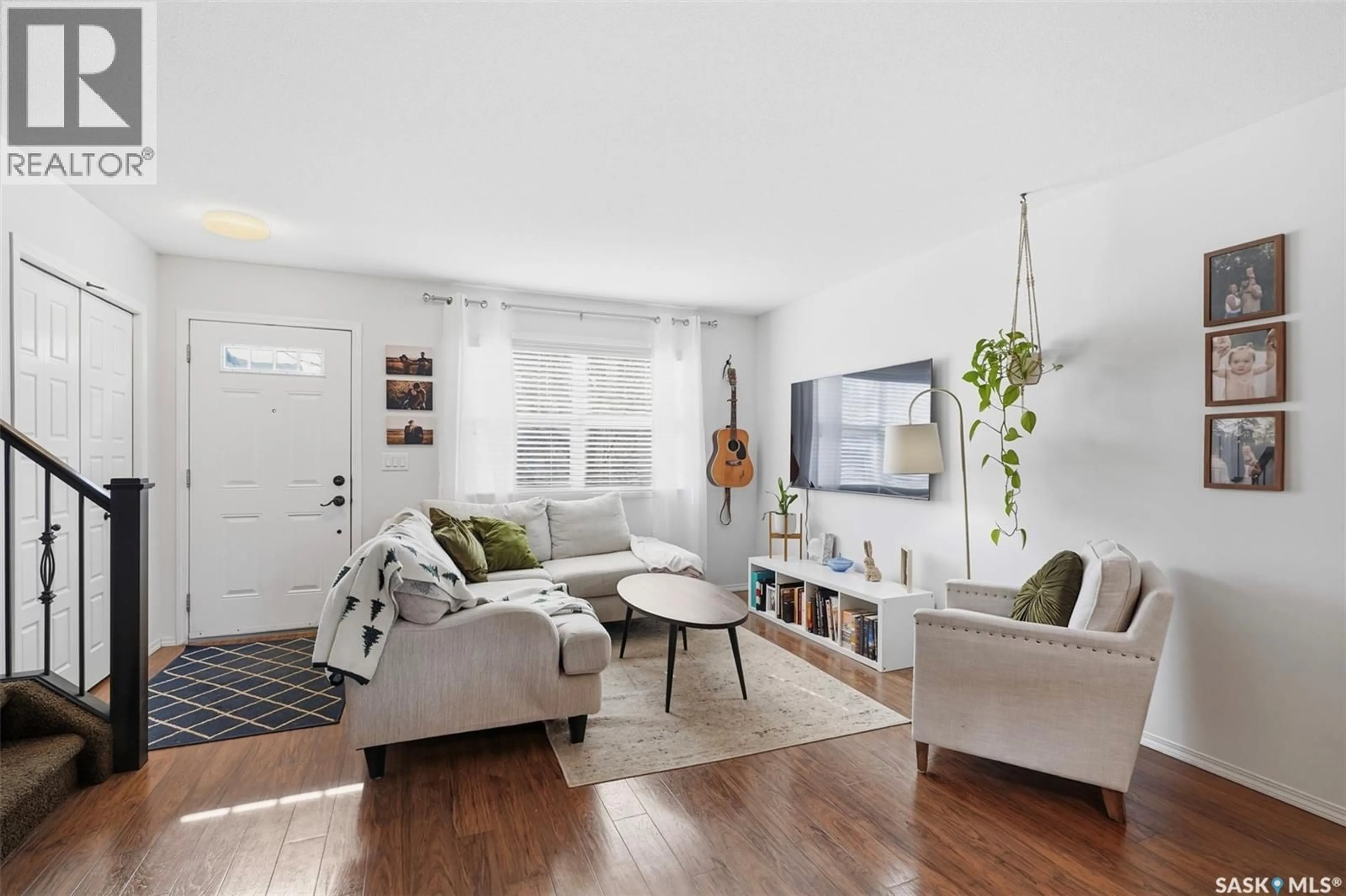 Living room with furniture, unknown for 406 150 LANGLOIS WAY, Saskatoon Saskatchewan S7T0L4