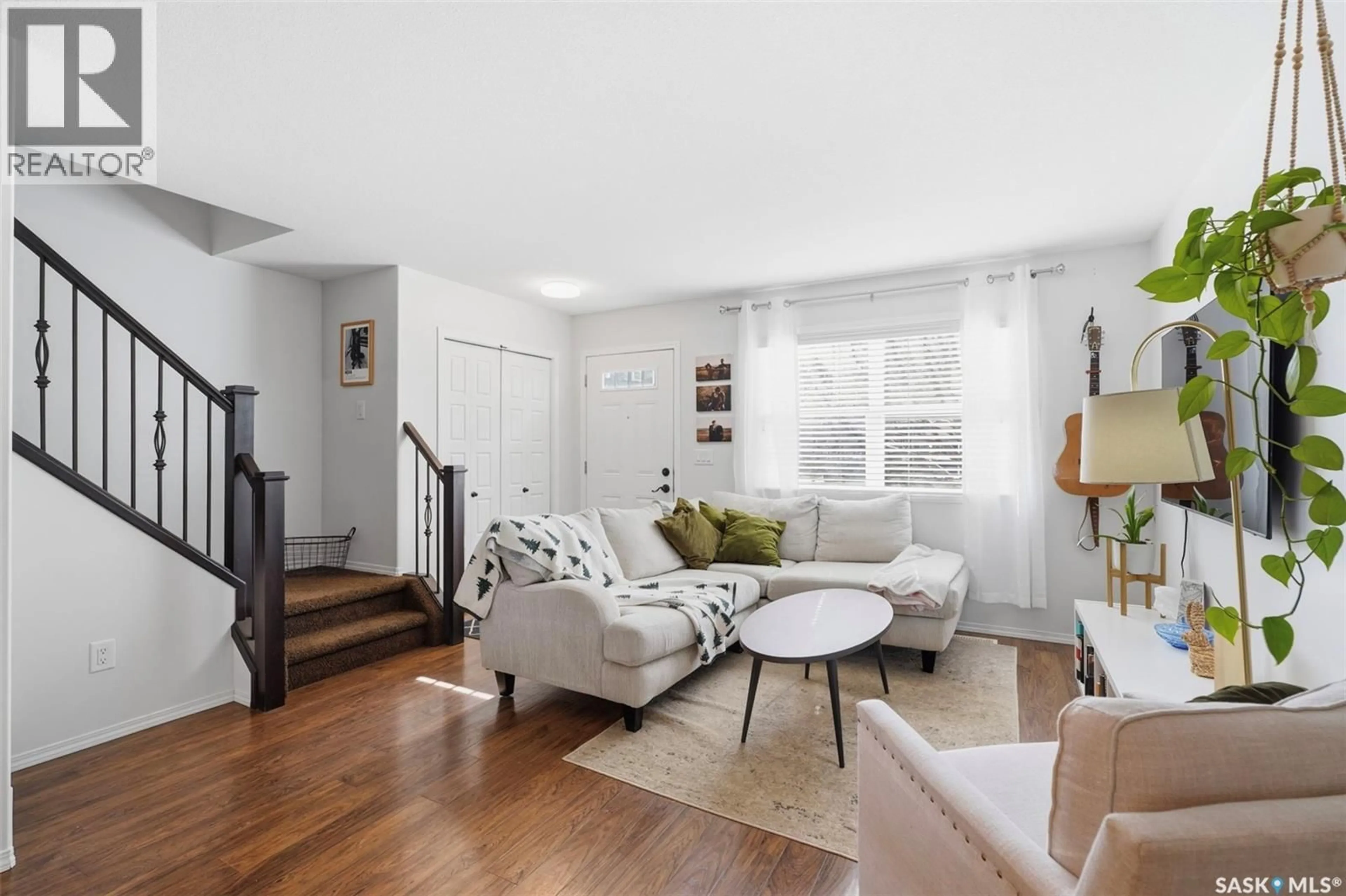 Living room with furniture, unknown for 406 150 LANGLOIS WAY, Saskatoon Saskatchewan S7T0L4