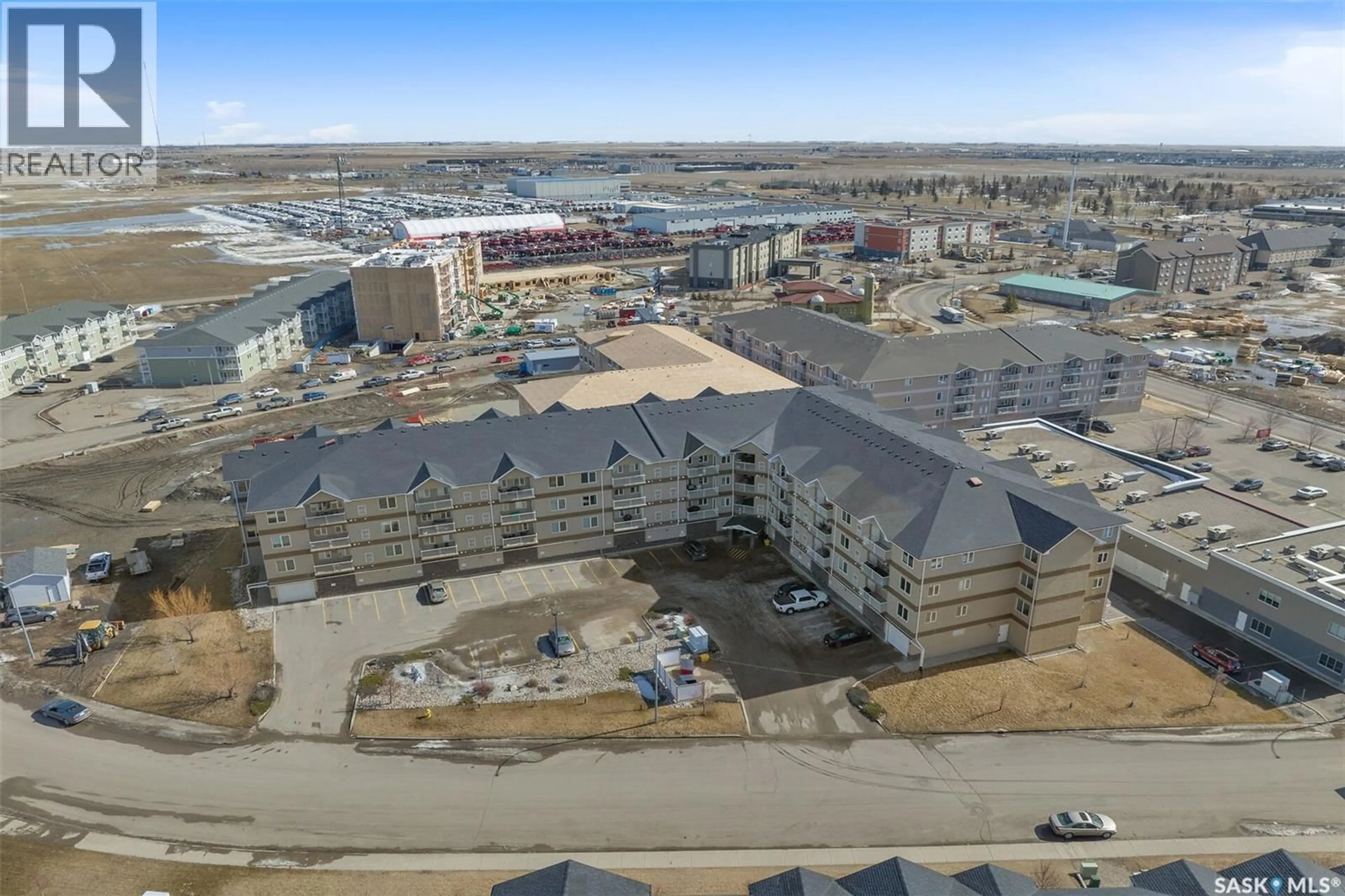 A pic from outside/outdoor area/front of a property/back of a property/a pic from drone, unknown for 105 - 1621 DAKOTA DRIVE, Regina Saskatchewan S4Z0A8