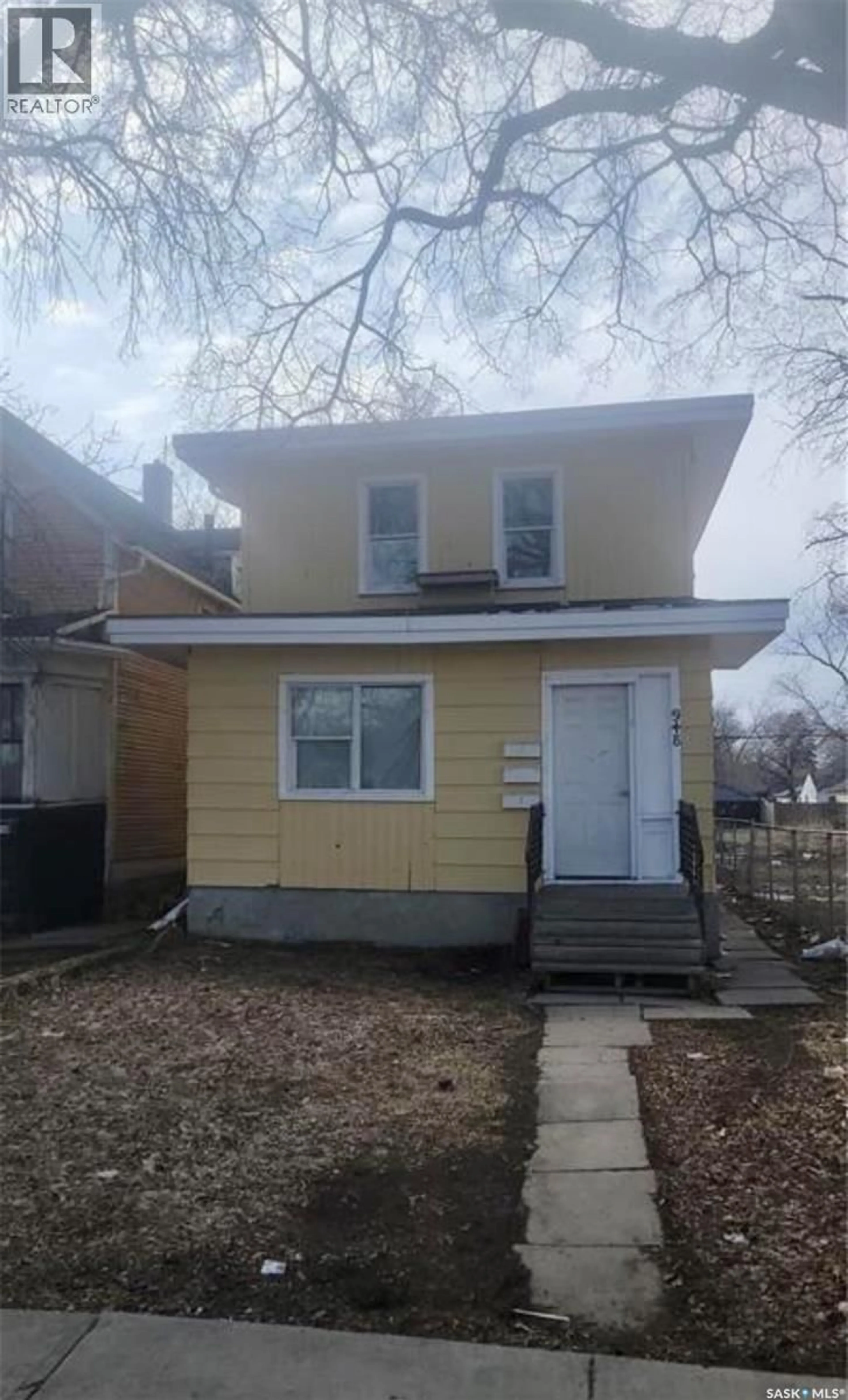 Home with vinyl exterior material, street for 948 GARNET STREET, Regina Saskatchewan S4T2X5