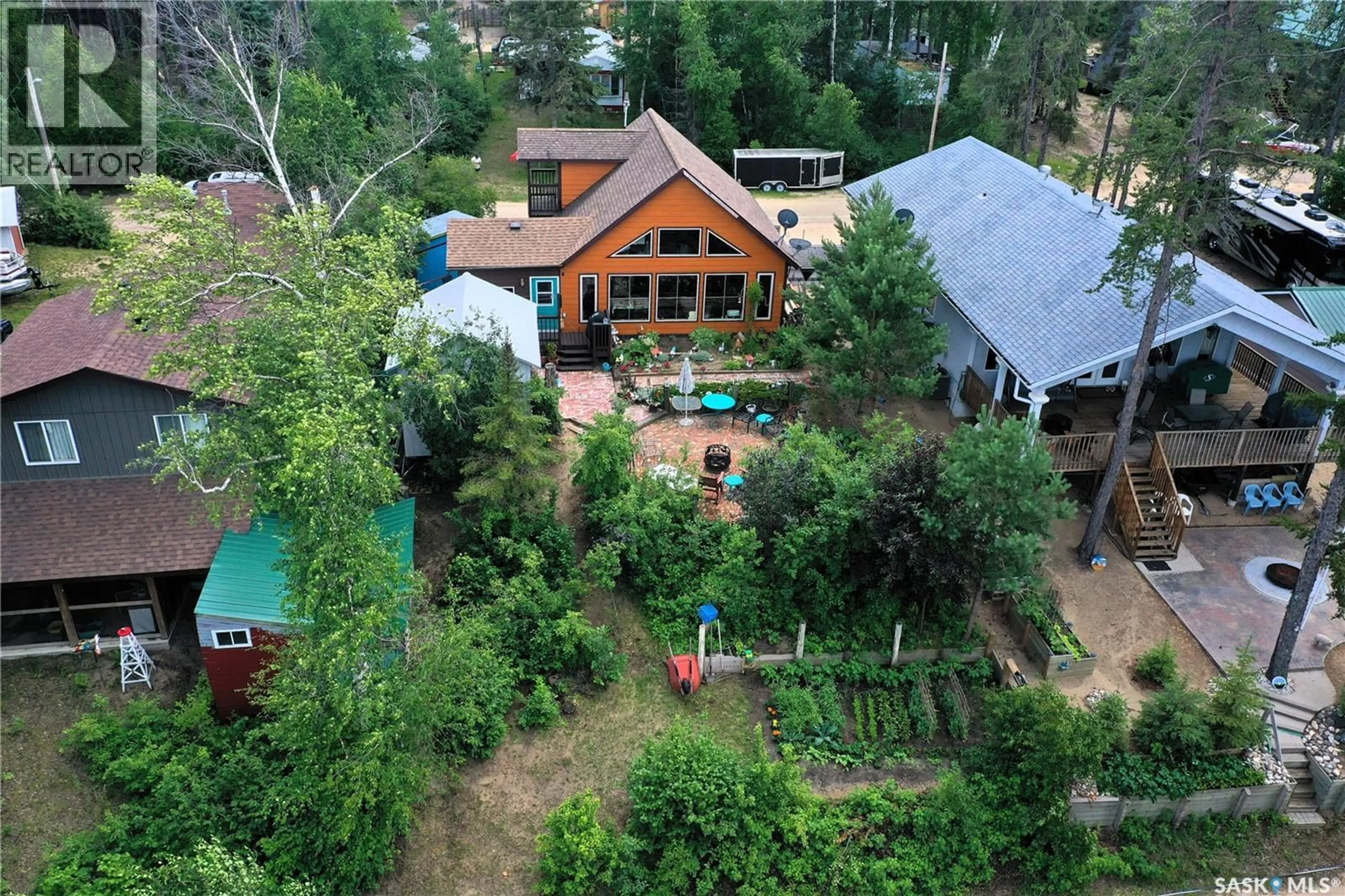 A pic from outside/outdoor area/front of a property/back of a property/a pic from drone, mountain view for 621 PINE DRIVE, Tobin Lake Saskatchewan S0E1E0