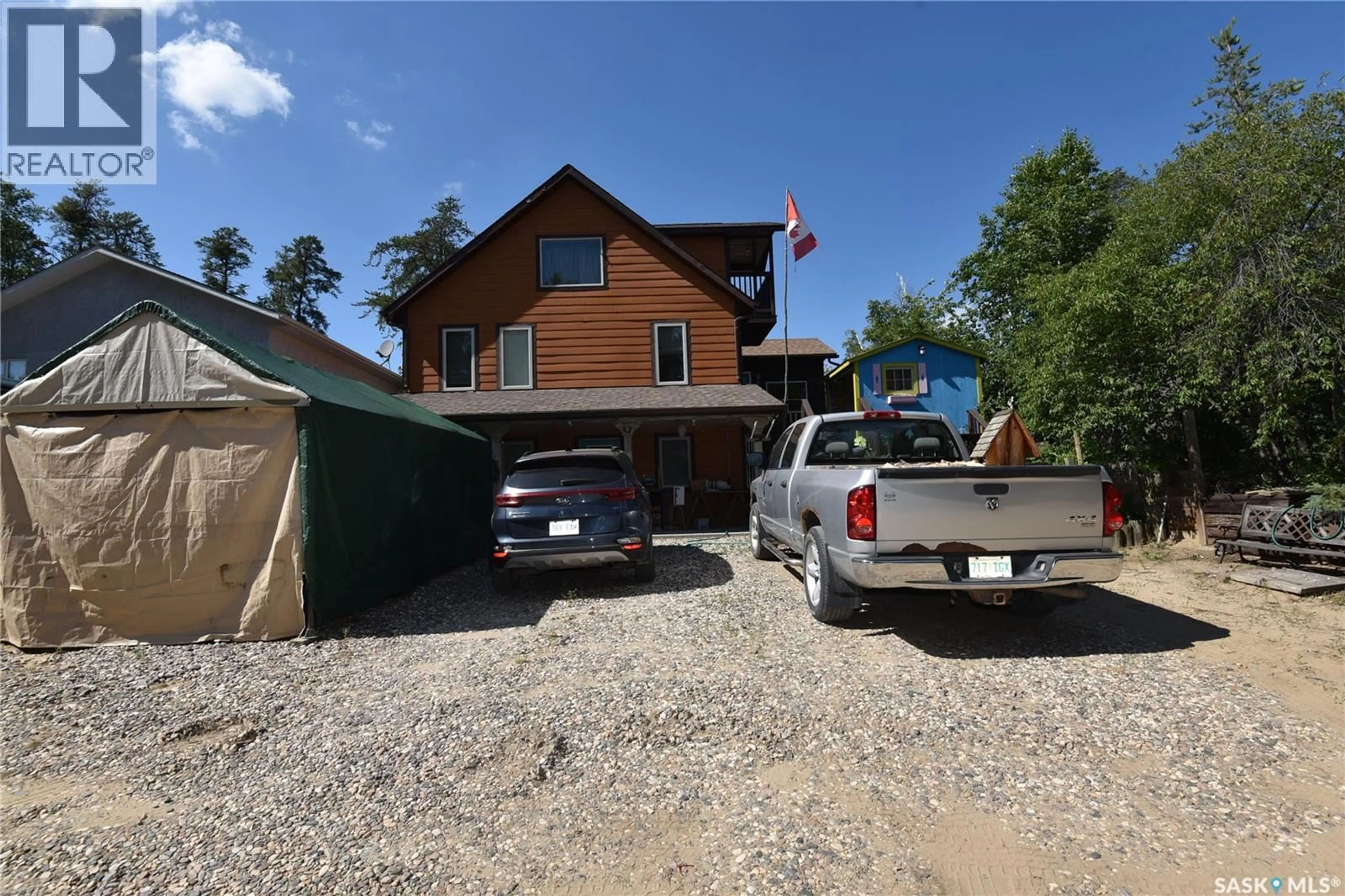 A pic from outside/outdoor area/front of a property/back of a property/a pic from drone, street for 621 PINE DRIVE, Tobin Lake Saskatchewan S0E1E0