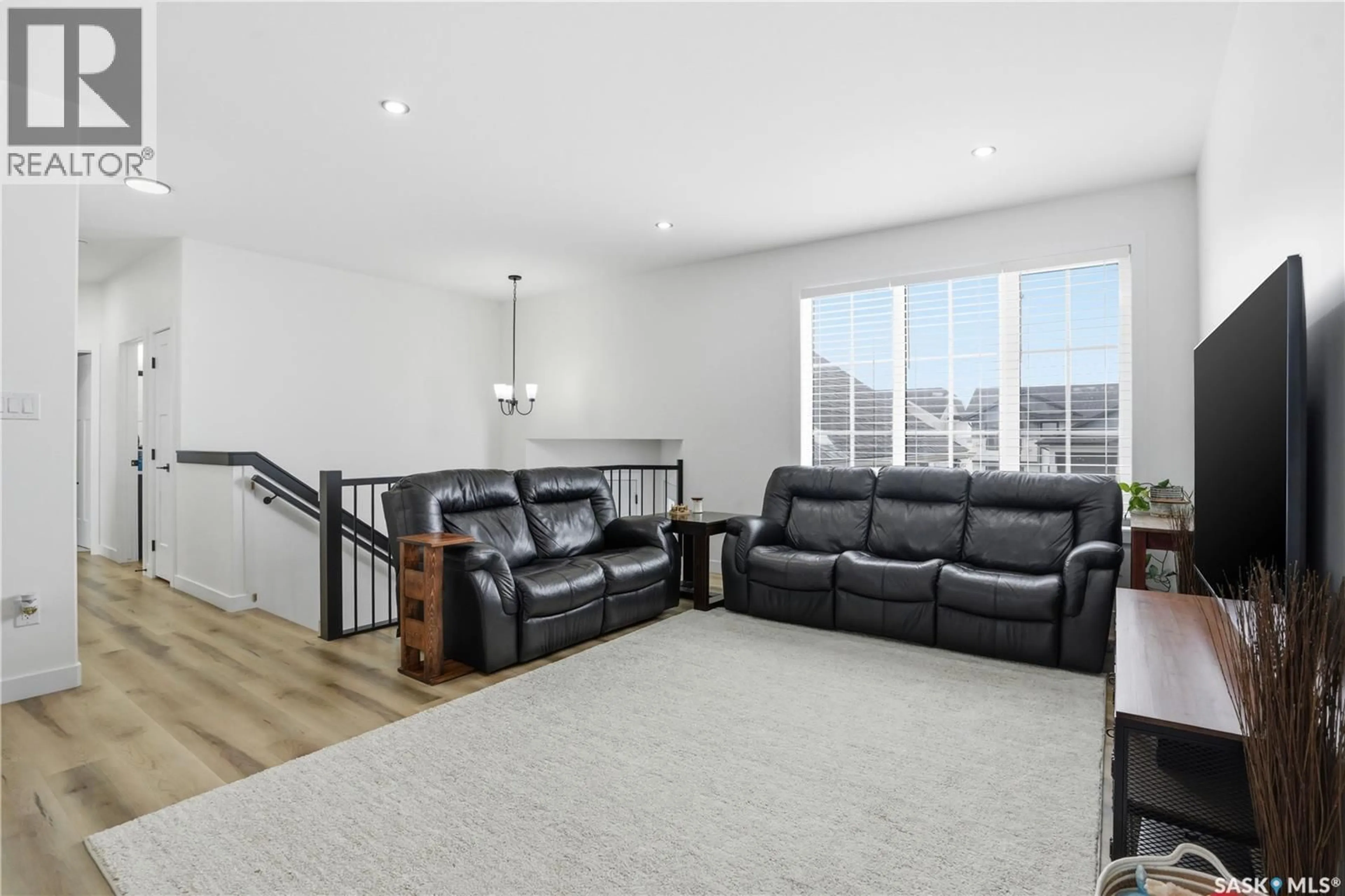 Living room with furniture, unknown for 827 WOODS CRESCENT, Warman Saskatchewan S0K4S4