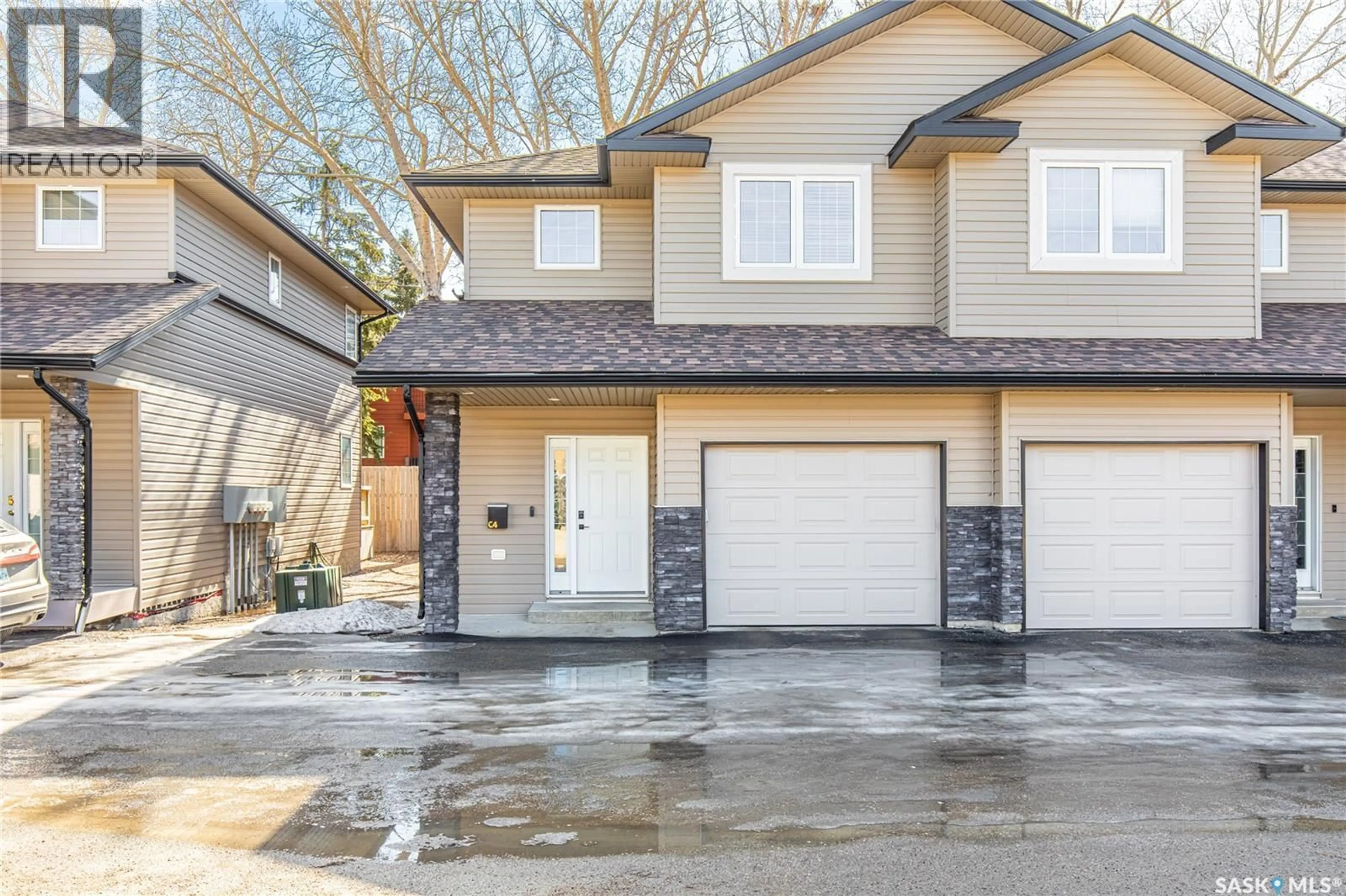 Home with vinyl exterior material, street for C4 - 33 WOOD LILY DRIVE, Moose Jaw Saskatchewan S6J1B4