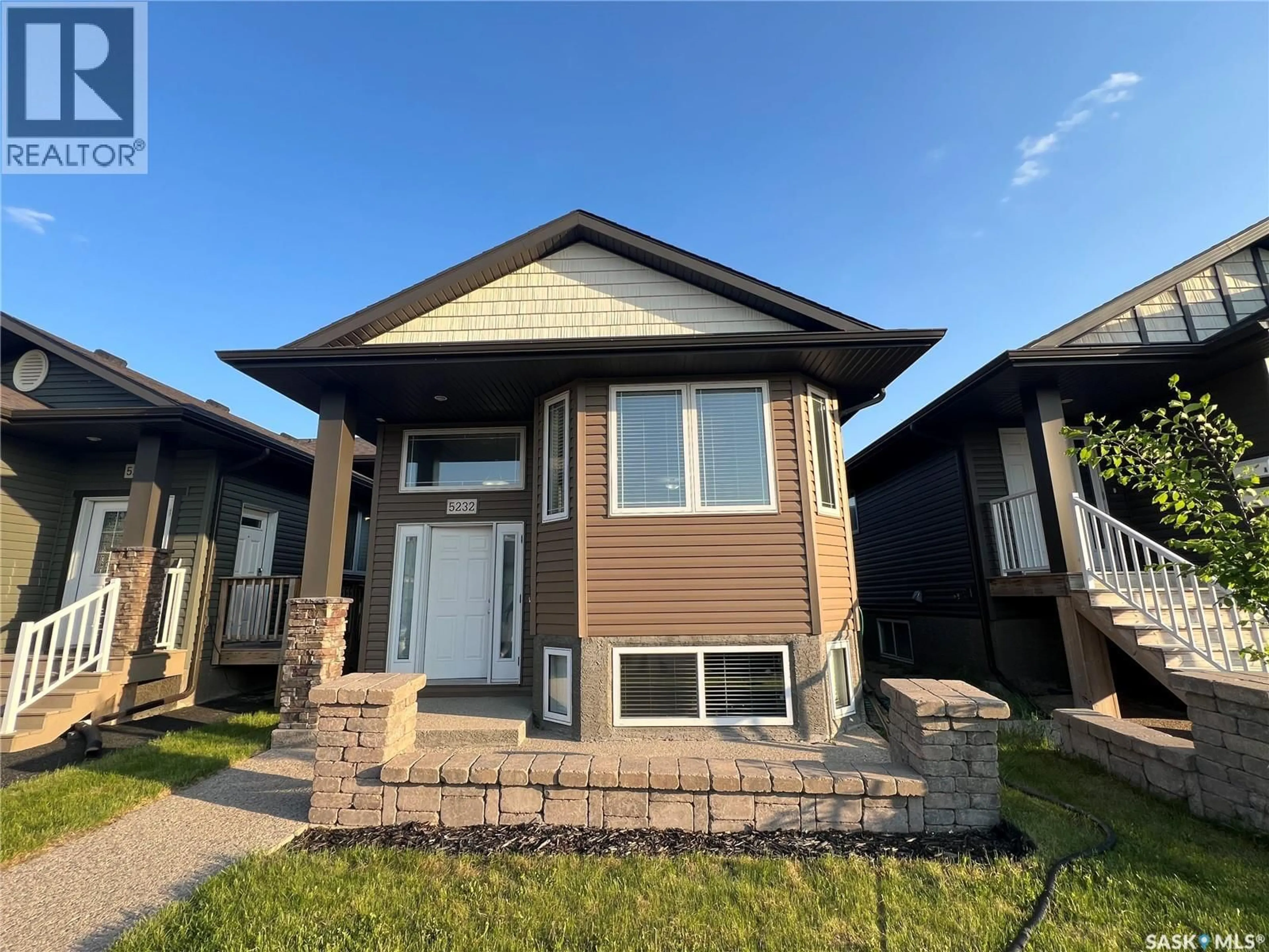 Home with brick exterior material, street for 5232 AERIAL CRESCENT, Regina Saskatchewan S4W0C8