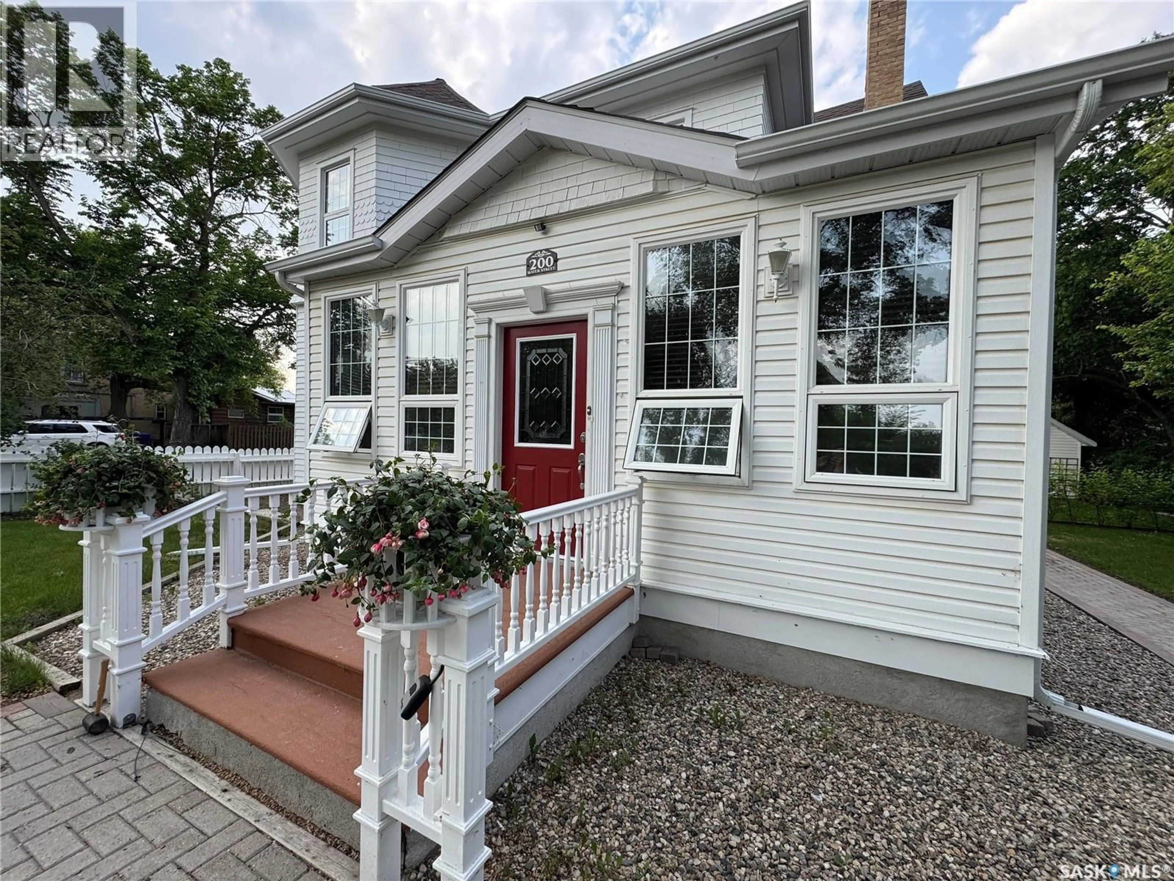 Home with vinyl exterior material, street for 200 WATER STREET, Wolseley Saskatchewan S0G5H0