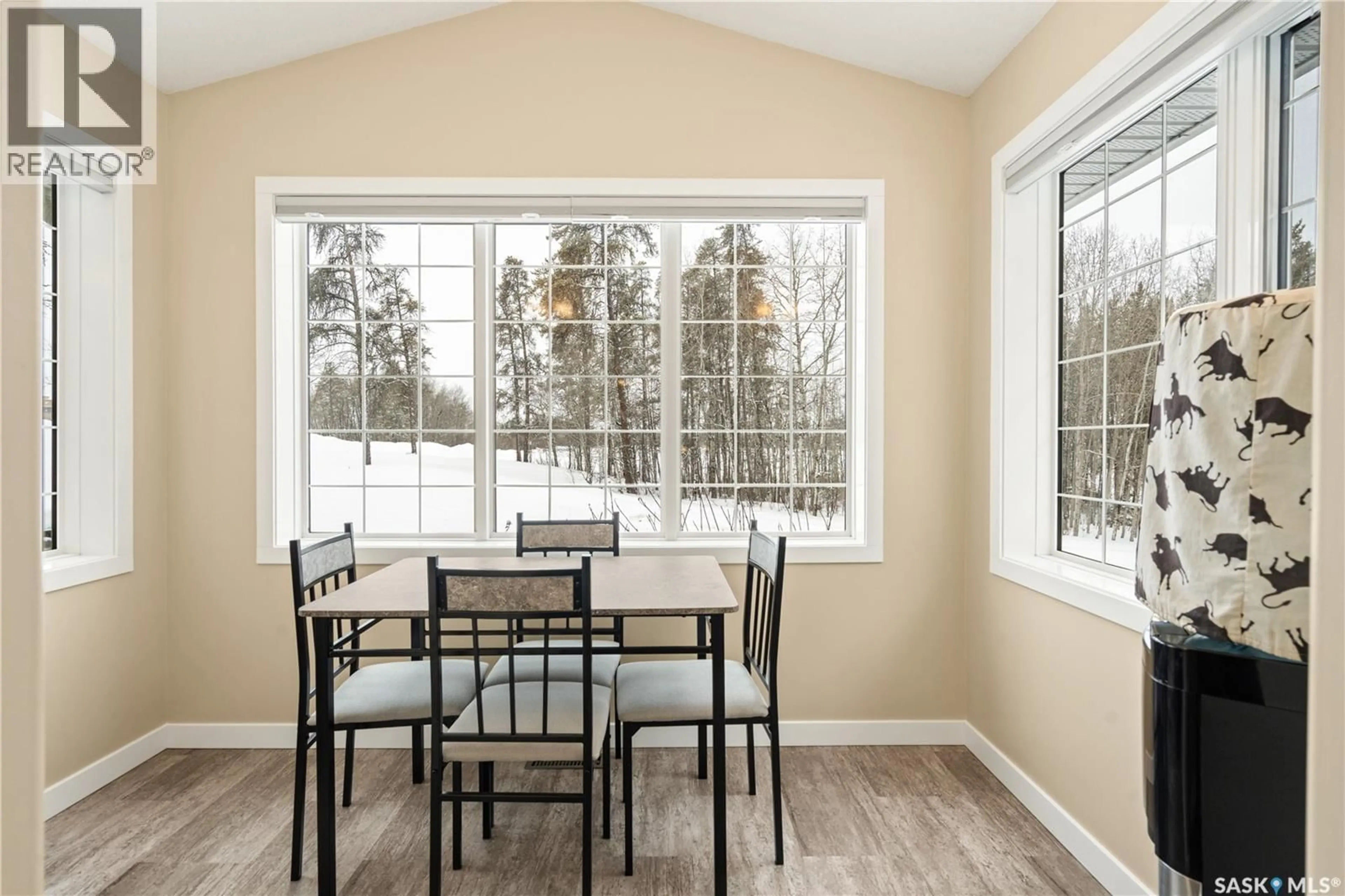 Dining room, wood/laminate floor for 172 3RD STREET, Pierceland Saskatchewan S0M2K0