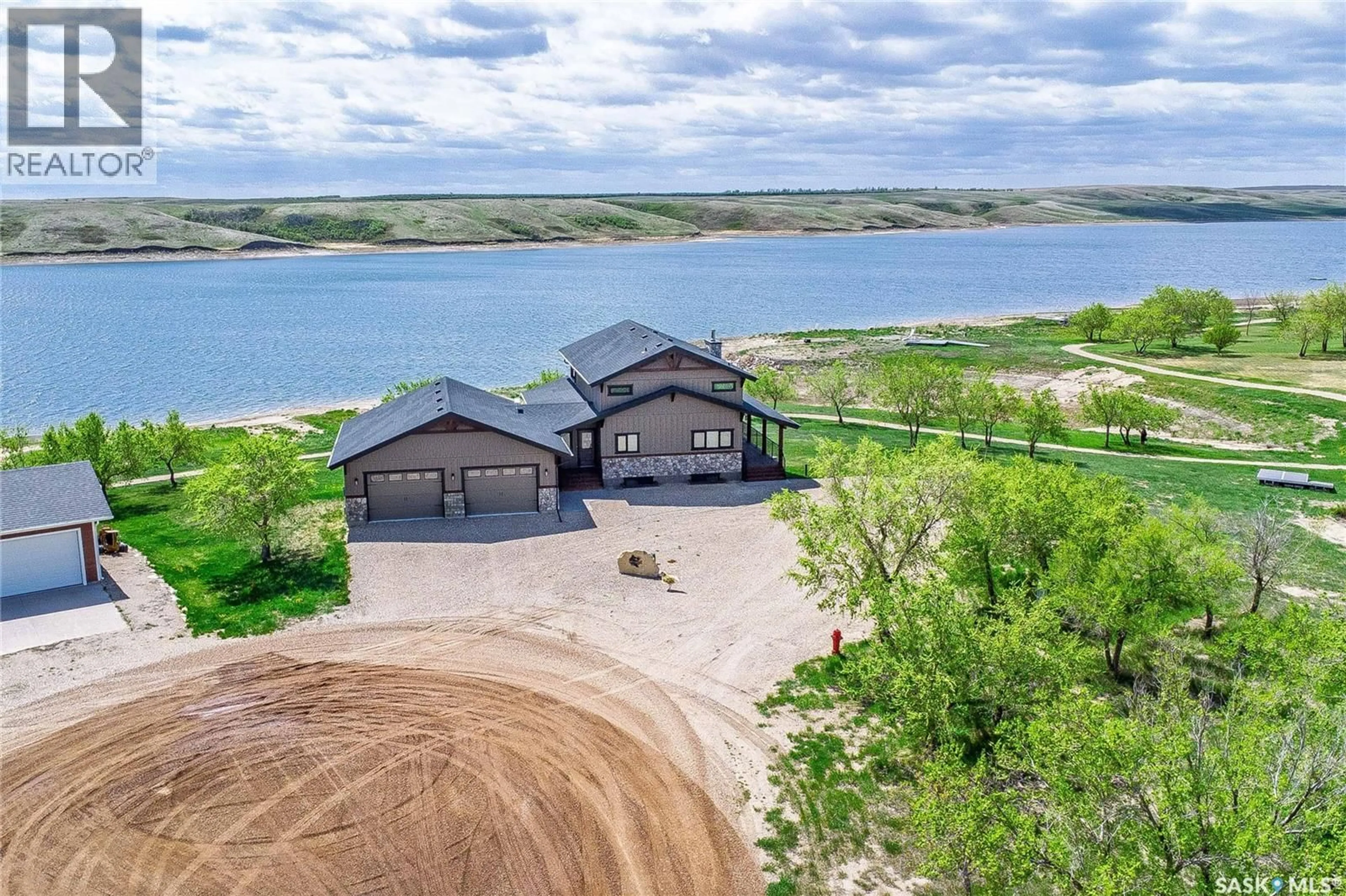 A pic from outside/outdoor area/front of a property/back of a property/a pic from drone, water/lake/river/ocean view for 35 GRACE BAY, Diefenbaker Lake Saskatchewan S0L2E0