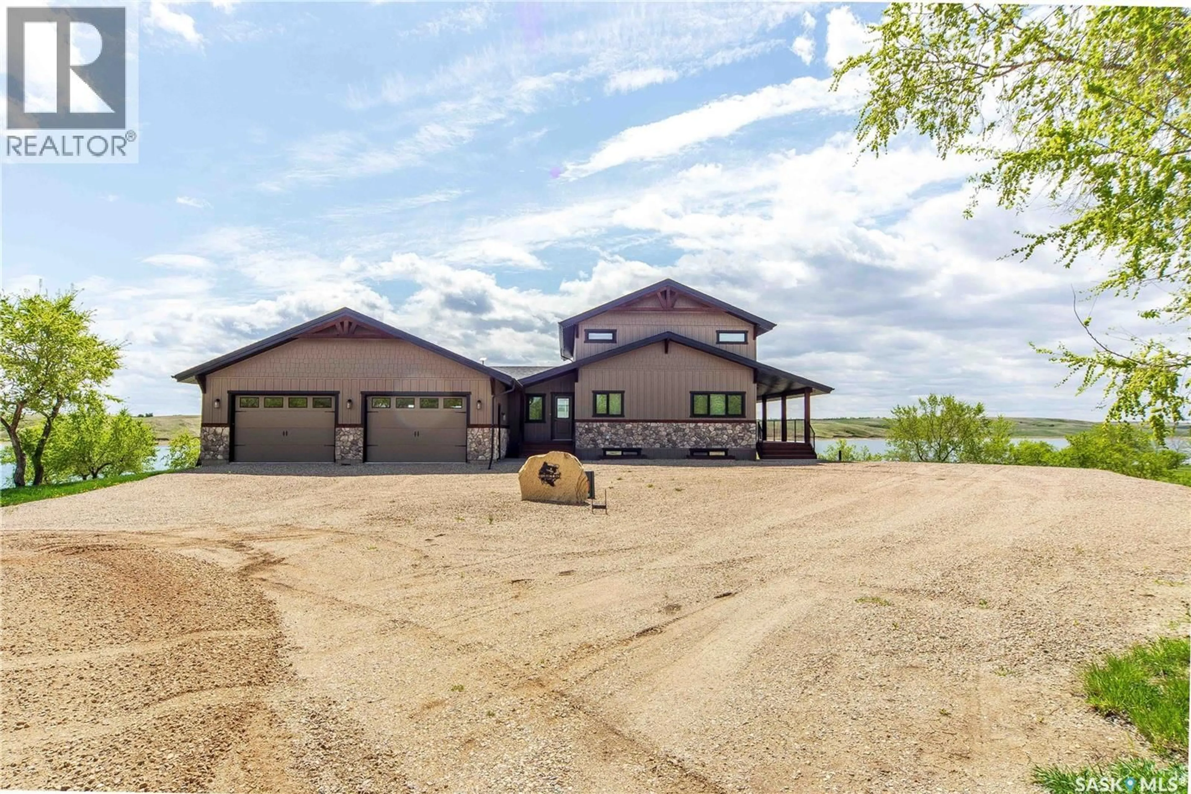A pic from outside/outdoor area/front of a property/back of a property/a pic from drone, unknown for 35 GRACE BAY, Diefenbaker Lake Saskatchewan S0L2E0
