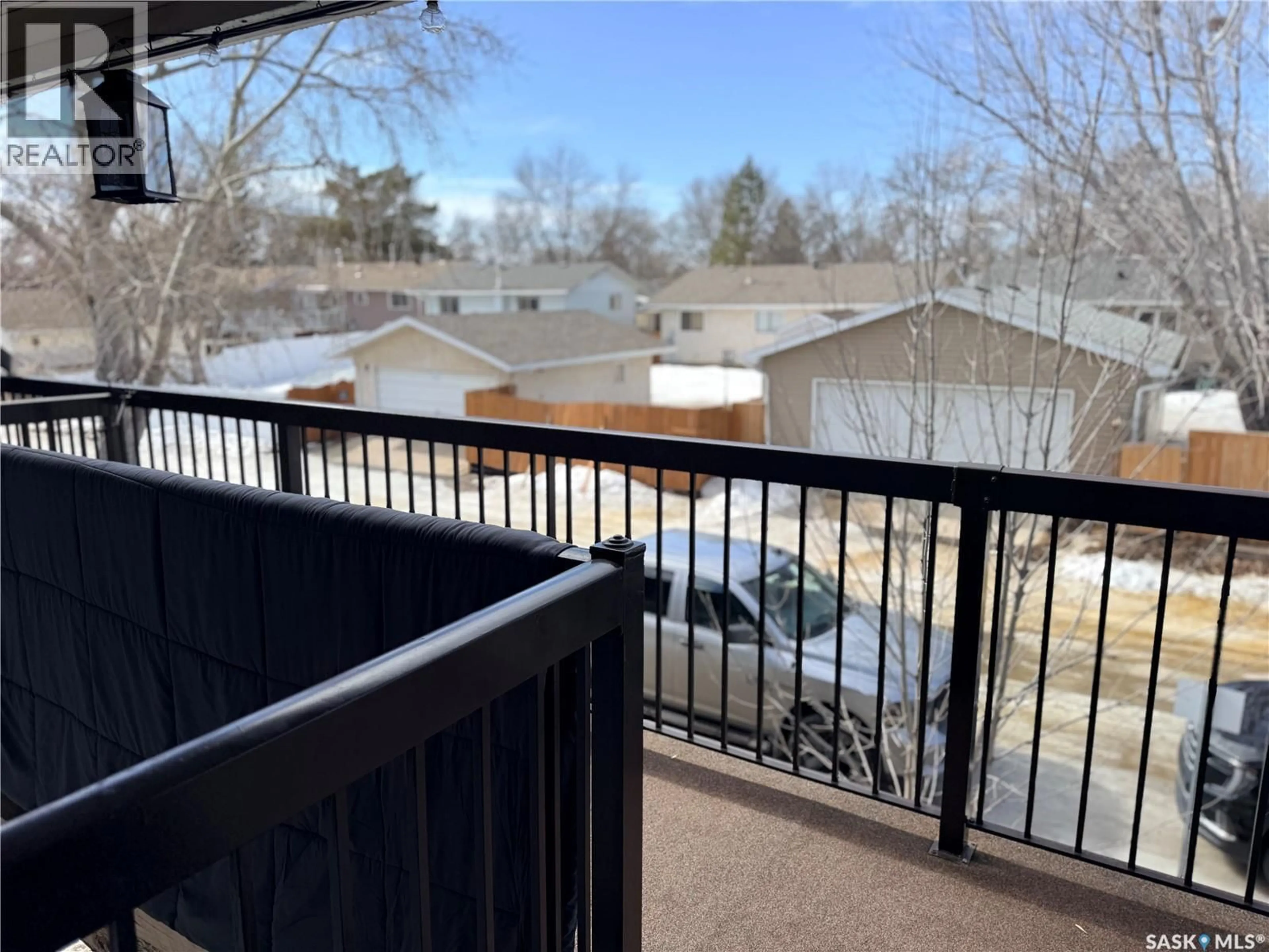 Patio, city buildings view from balcony for 116 GORE PLACE, Regina Saskatchewan S4T7S4