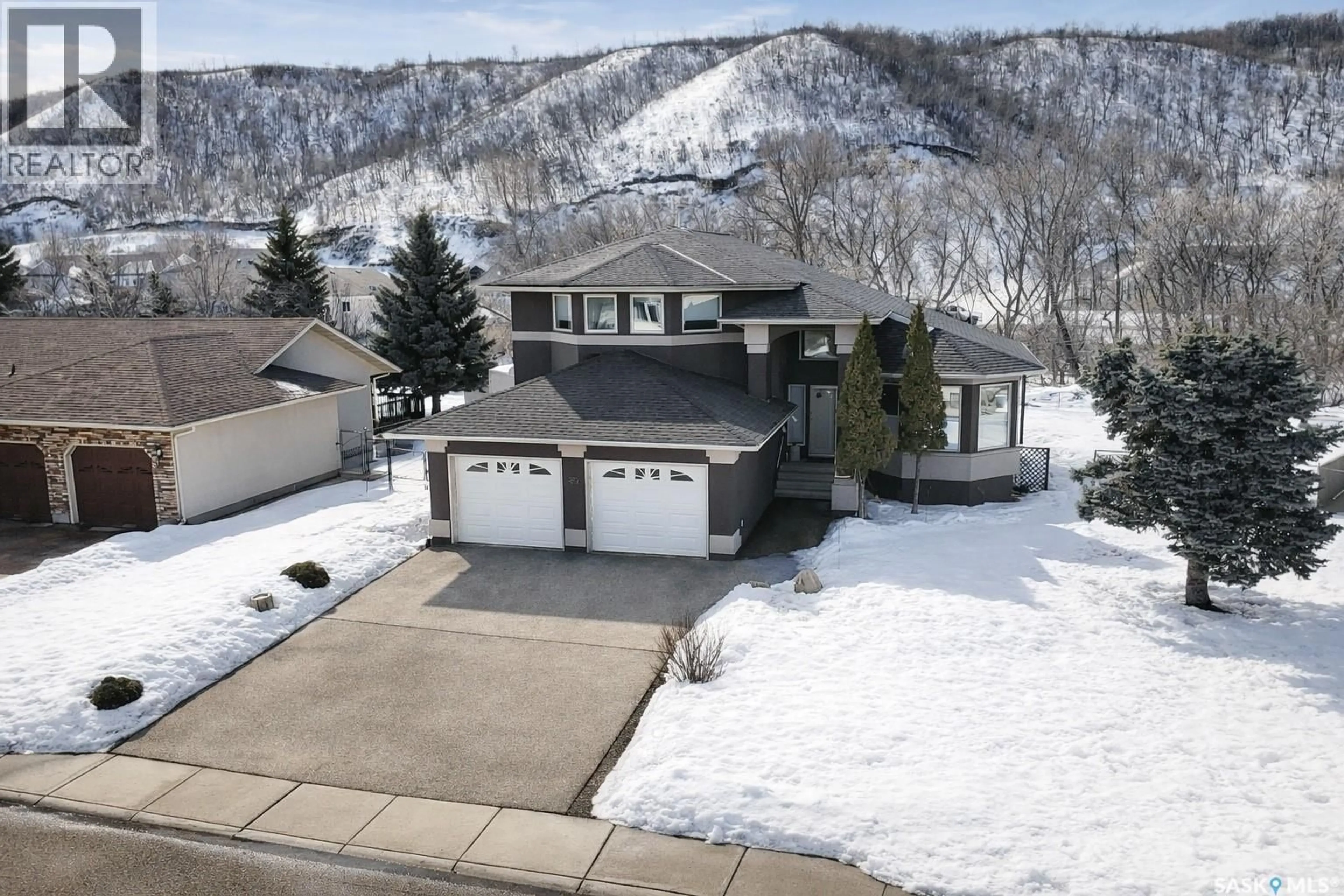 A pic from outside/outdoor area/front of a property/back of a property/a pic from drone, mountain view for 20 WILLOW CRESCENT, Fort Qu'Appelle Saskatchewan S0G1S0