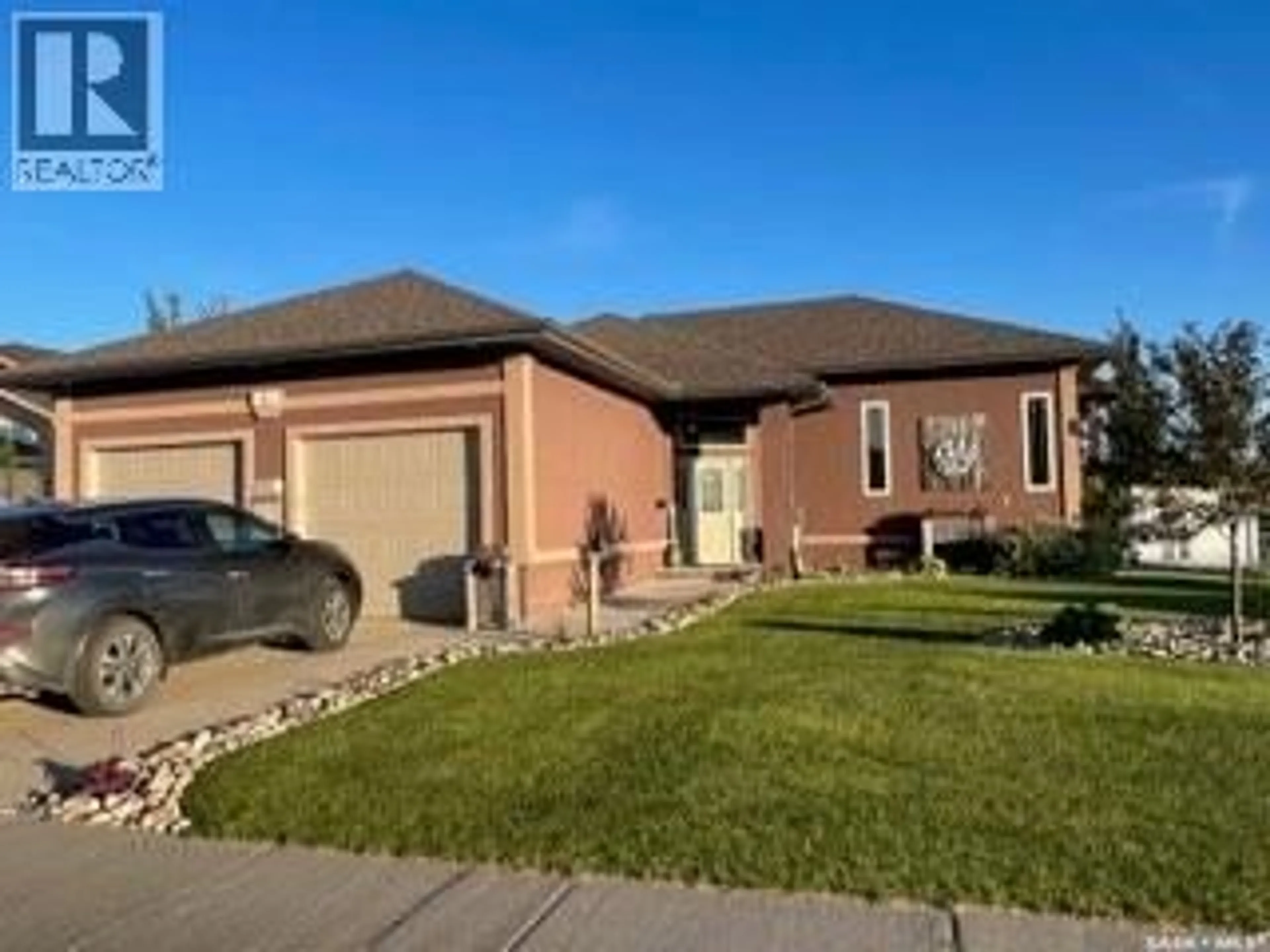 Home with brick exterior material, street for 4 ROSS DRIVE, Yorkton Saskatchewan S3N4A1