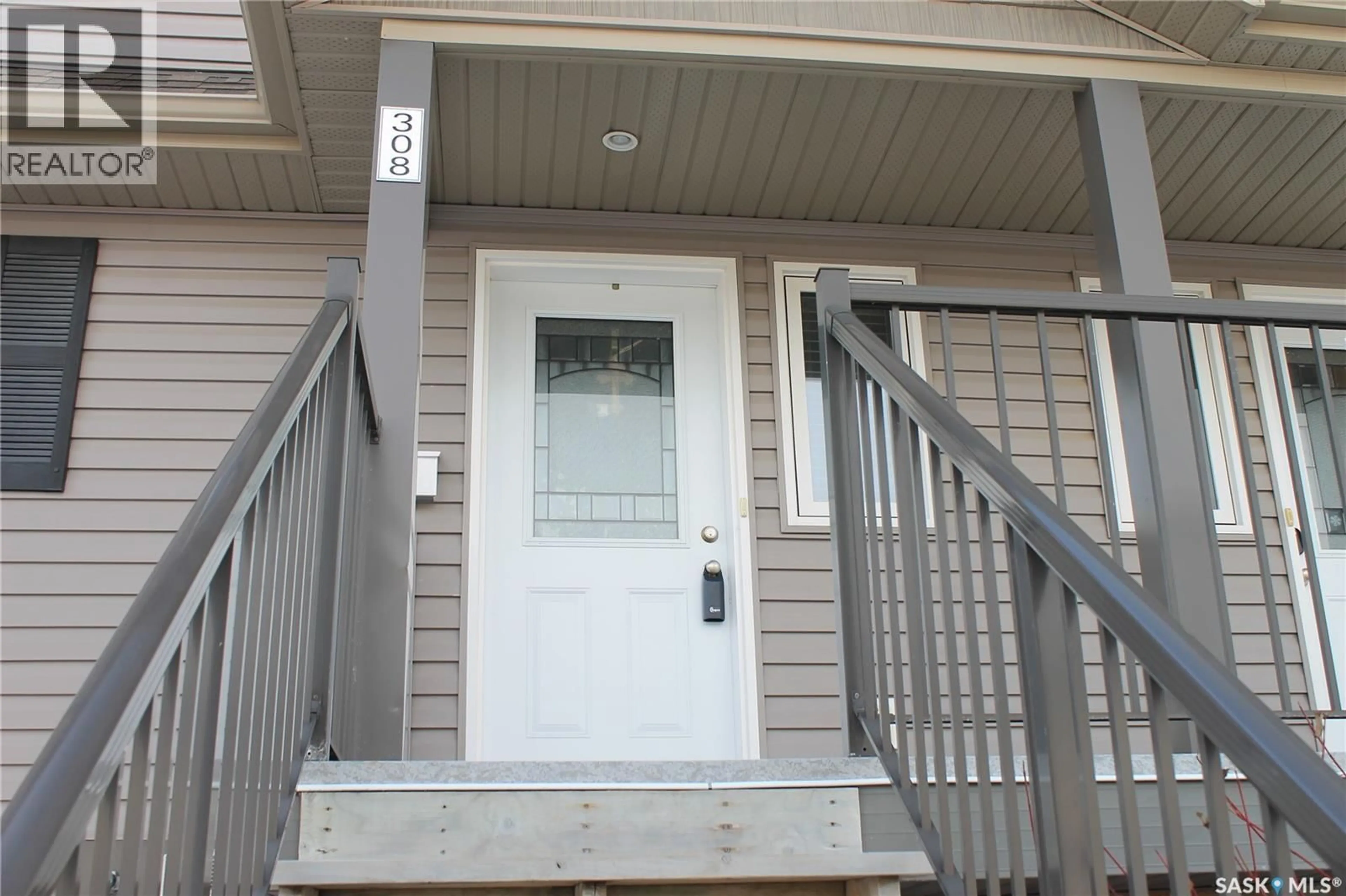 Home with vinyl exterior material, street for 308 - 115 DALGLEISH LINK, Saskatoon Saskatchewan S7W0N5