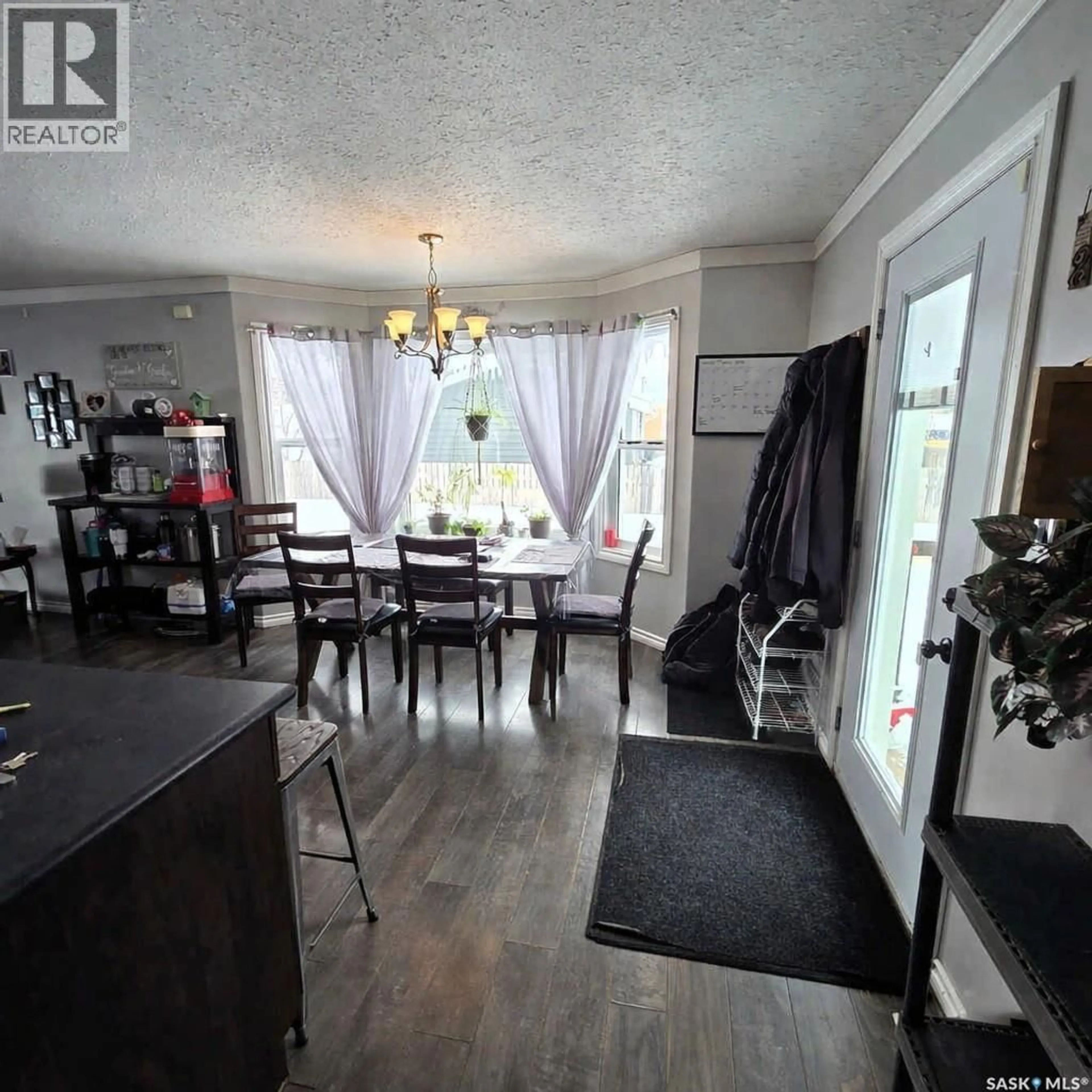 Dining room, wood/laminate floor for 401 6TH AVENUE, Nipawin Saskatchewan S0E1E0