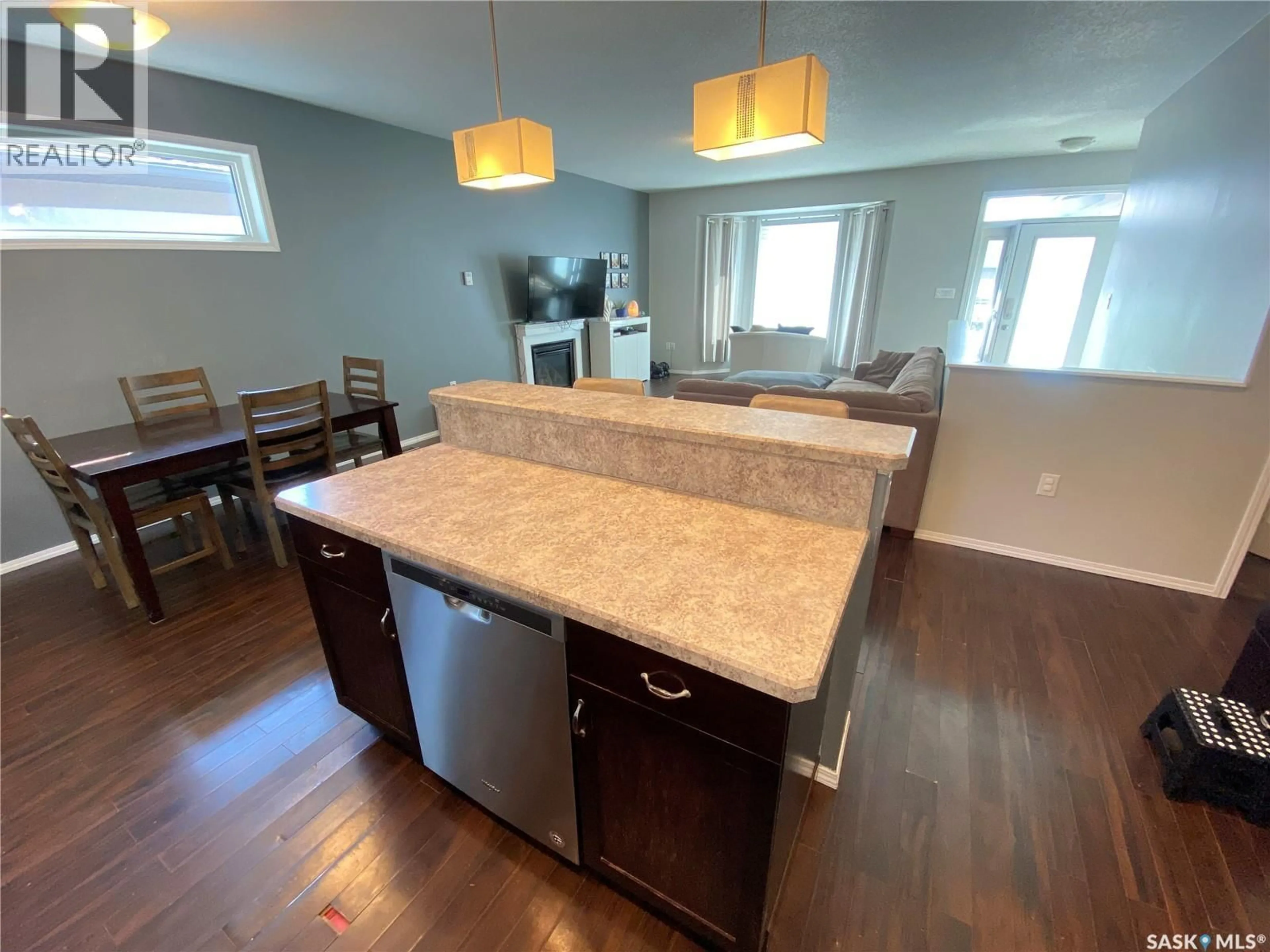 Open concept kitchen, unknown for 703 BARBER CRESCENT, Weyburn Saskatchewan S4H0B9
