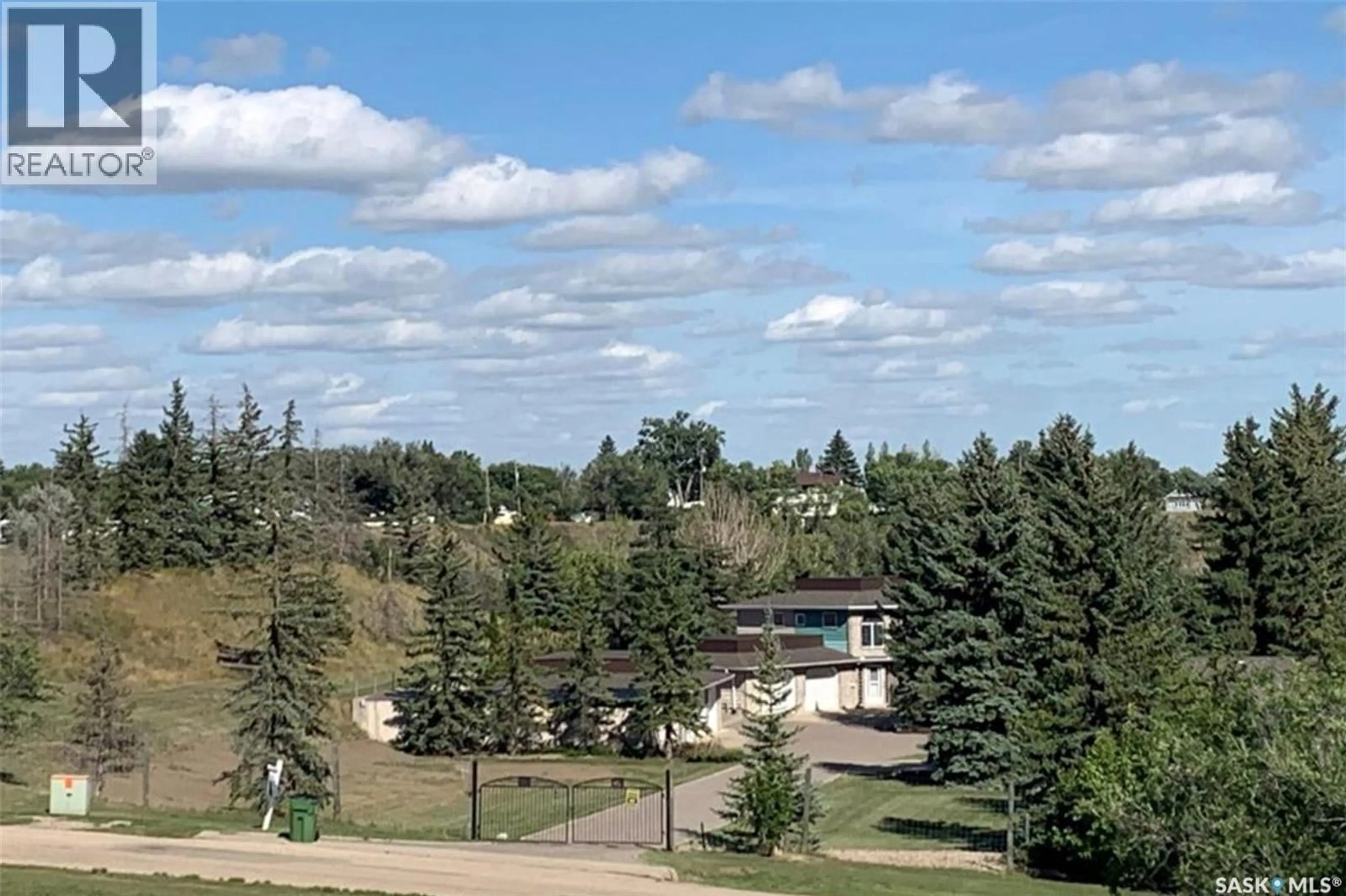 A pic from outside/outdoor area/front of a property/back of a property/a pic from drone, unknown for 1055 7TH AVENUE, Moose Jaw Saskatchewan S6H5R2