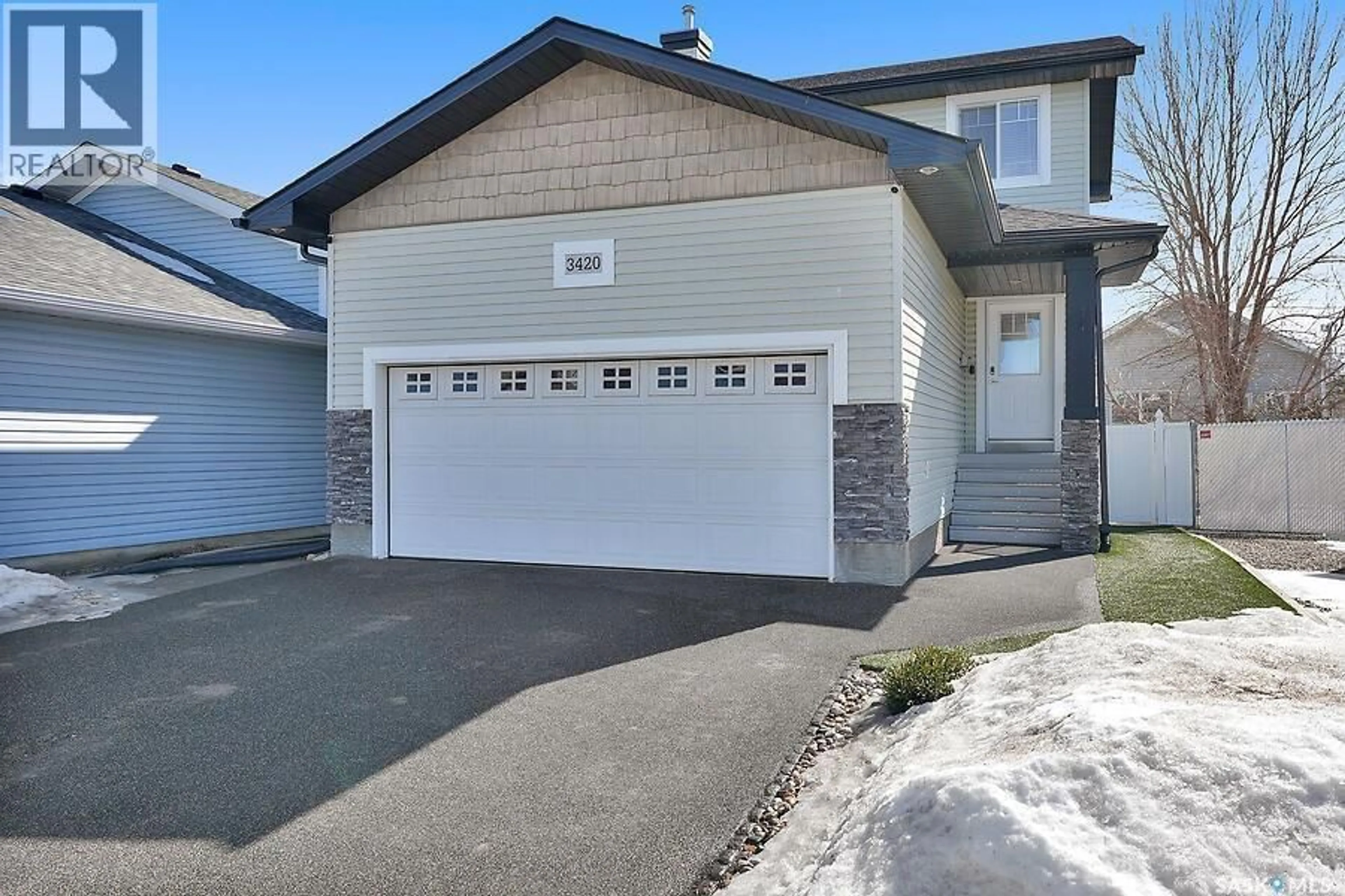 Home with vinyl exterior material, street for 3420 MACLACHLAN CRESCENT, Regina Saskatchewan S4R8V1