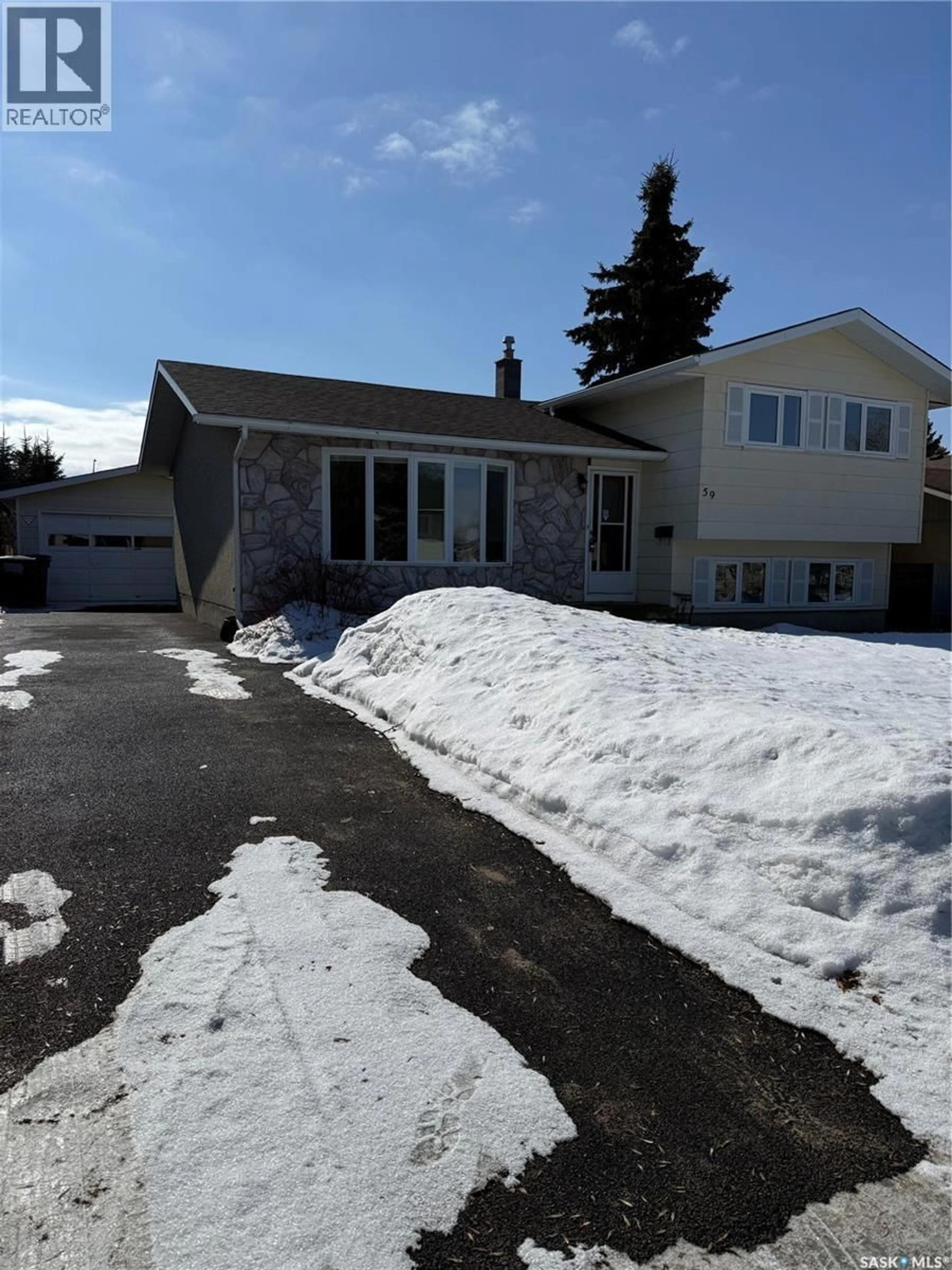 Home with vinyl exterior material, street for 59 MCDOUGALL CRESCENT, Saskatoon Saskatchewan S7L5B9