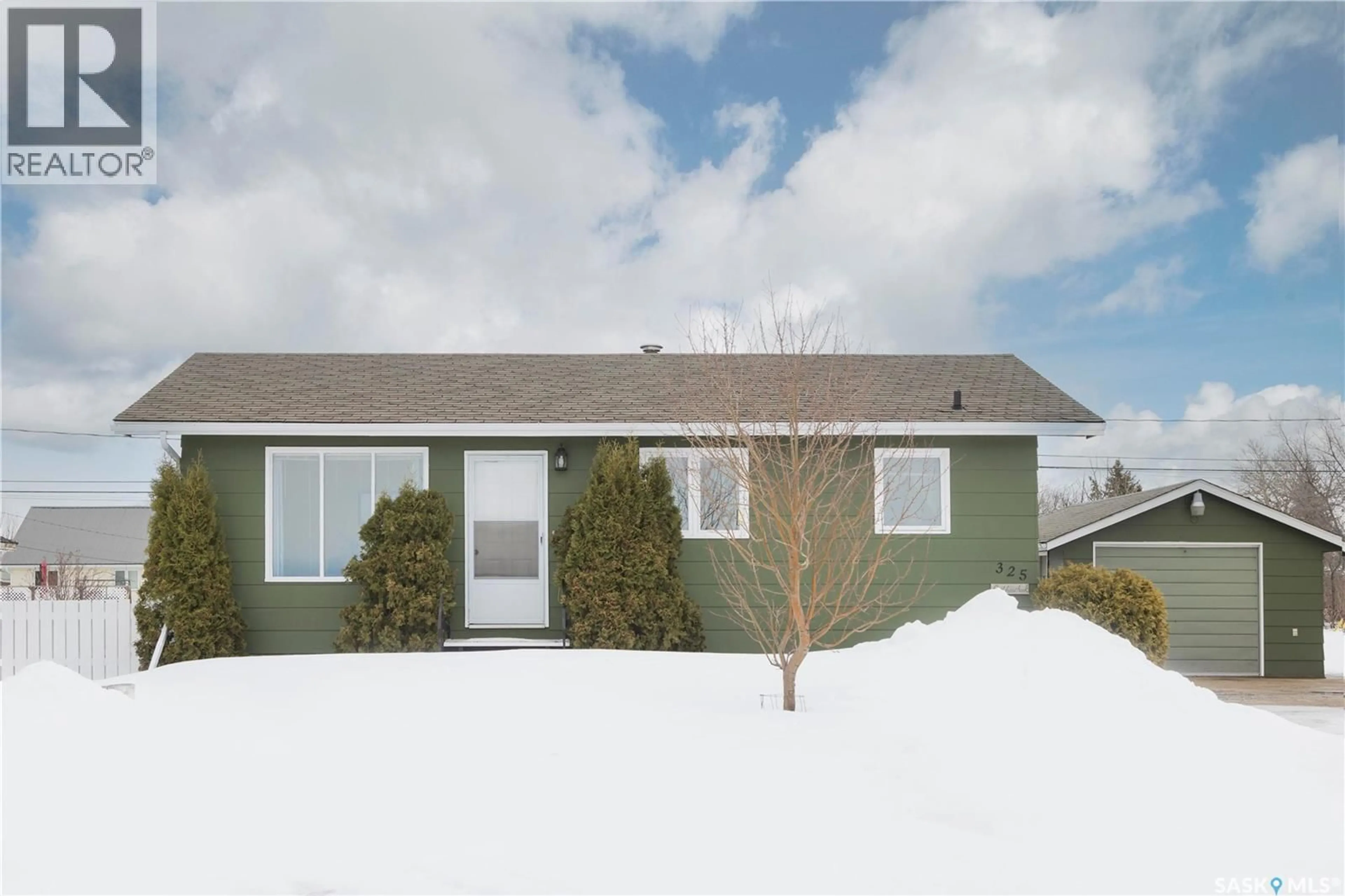 Home with vinyl exterior material, street for 325 7TH STREET, Duck Lake Saskatchewan S0K1J0