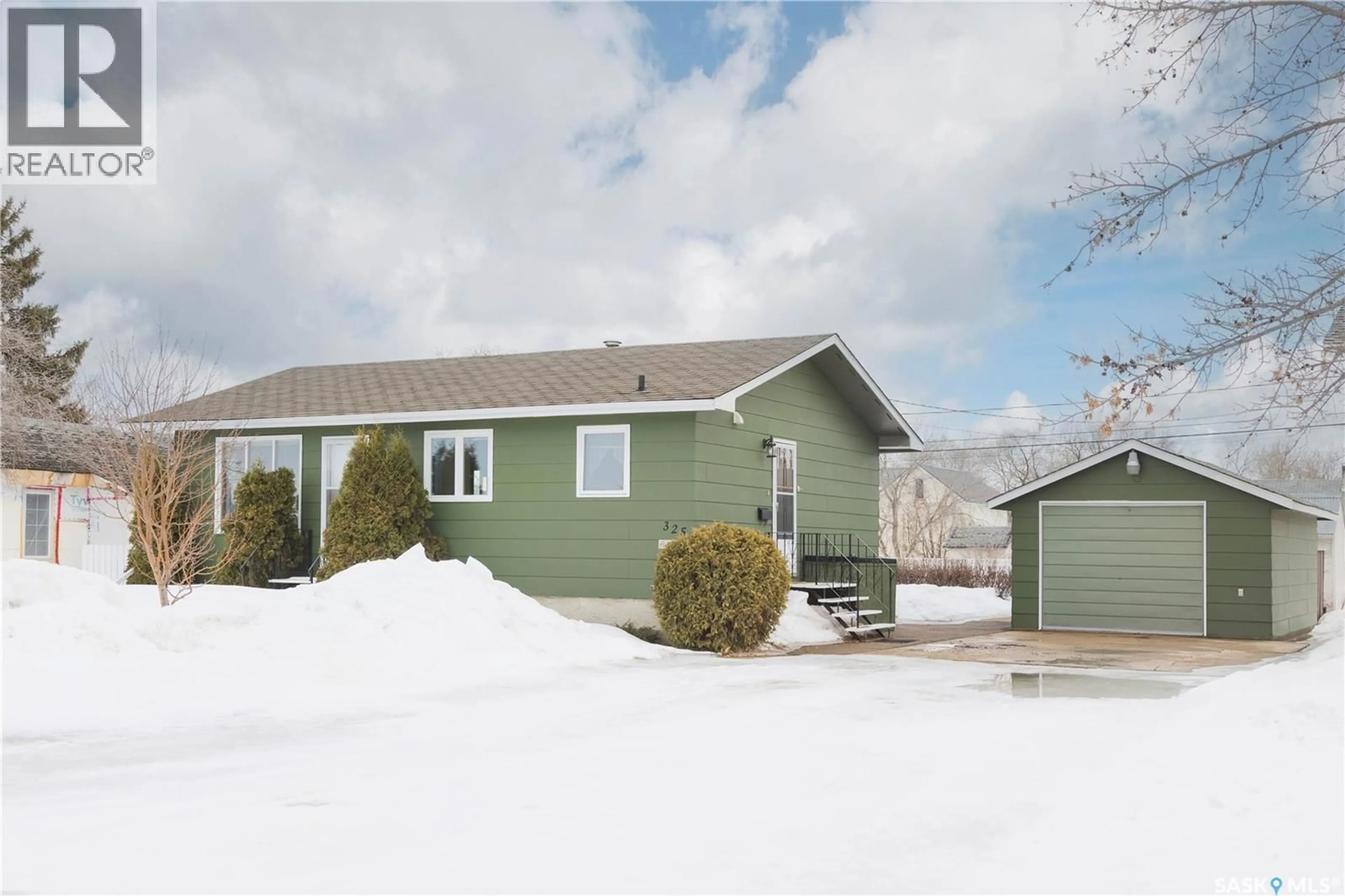 Home with vinyl exterior material, street for 325 7TH STREET, Duck Lake Saskatchewan S0K1J0