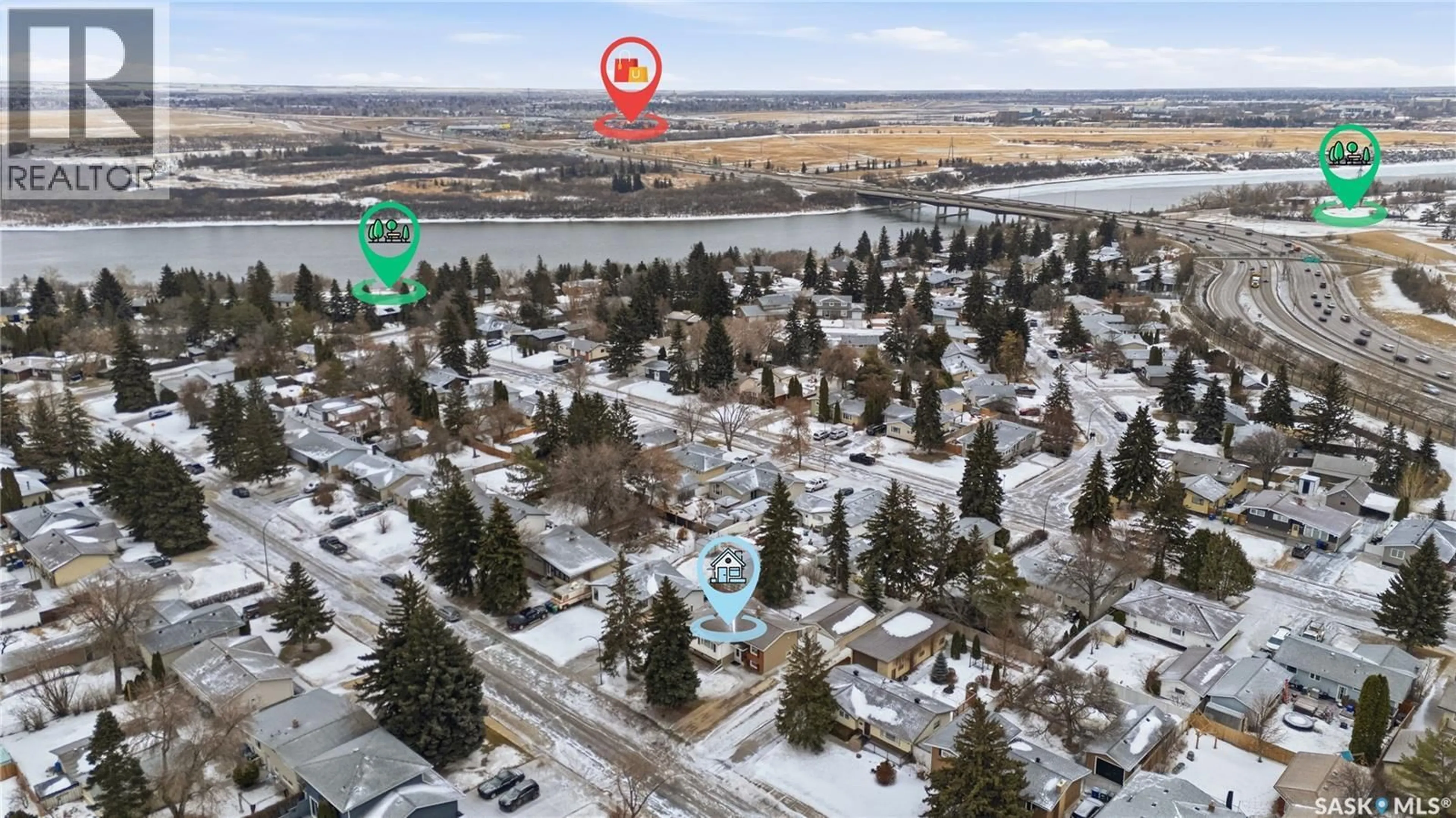 A pic from outside/outdoor area/front of a property/back of a property/a pic from drone, unknown for 41 RED RIVER ROAD, Saskatoon Saskatchewan S7K1G2