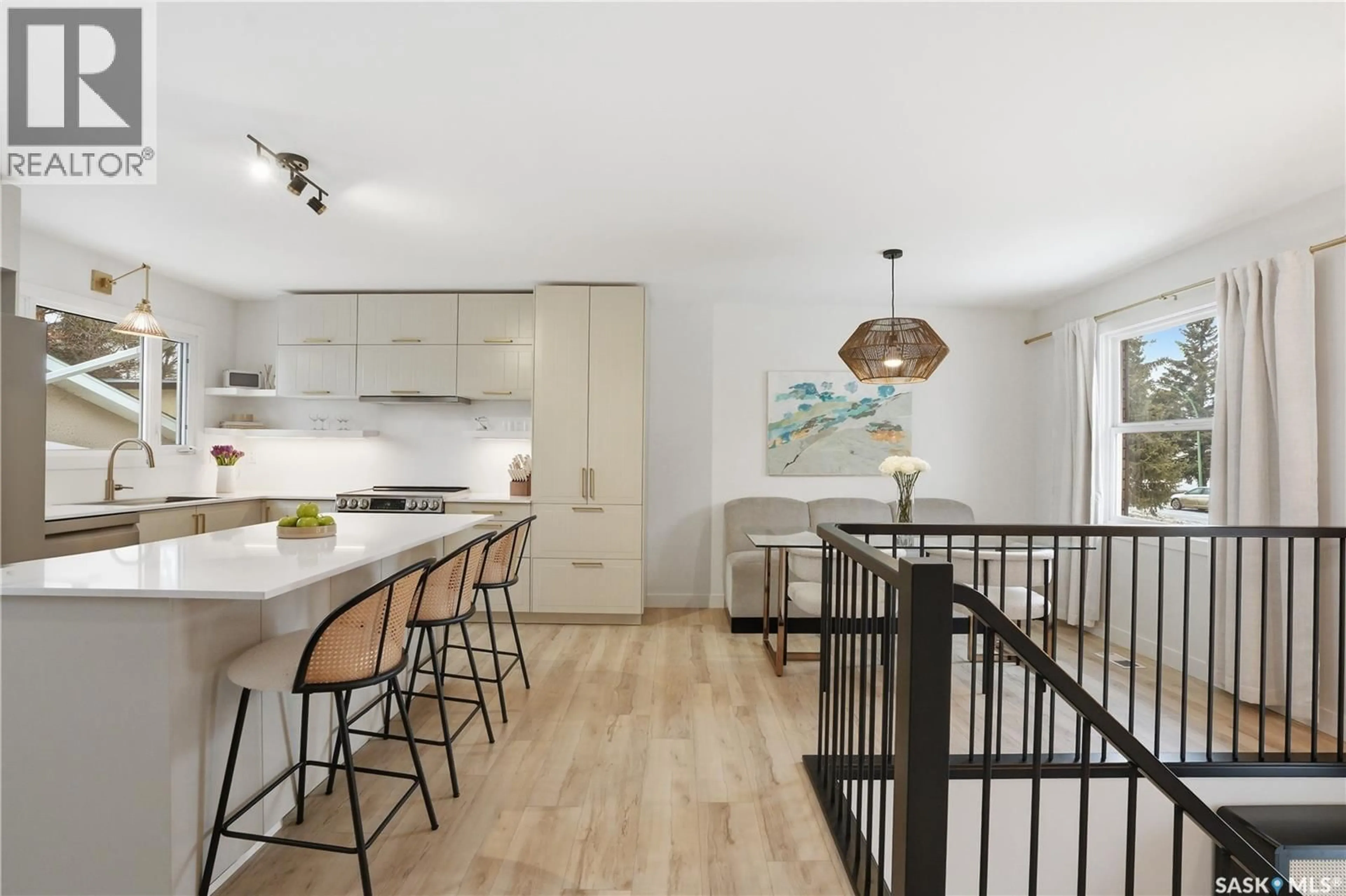 Open concept kitchen, wood/laminate floor for 41 RED RIVER ROAD, Saskatoon Saskatchewan S7K1G2