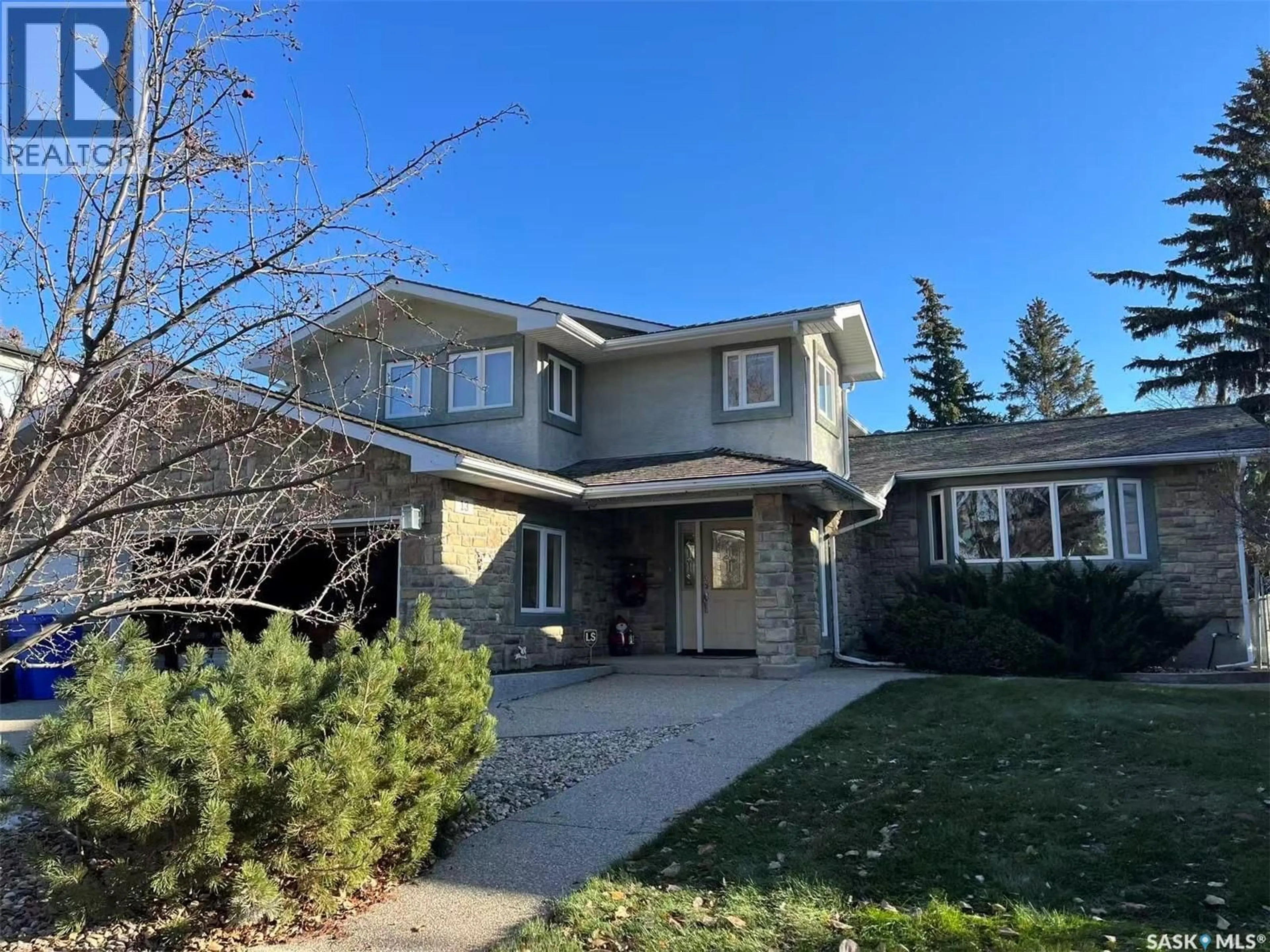 Home with vinyl exterior material, street for 13 MARTIN STREET, Regina Saskatchewan S4S3W2