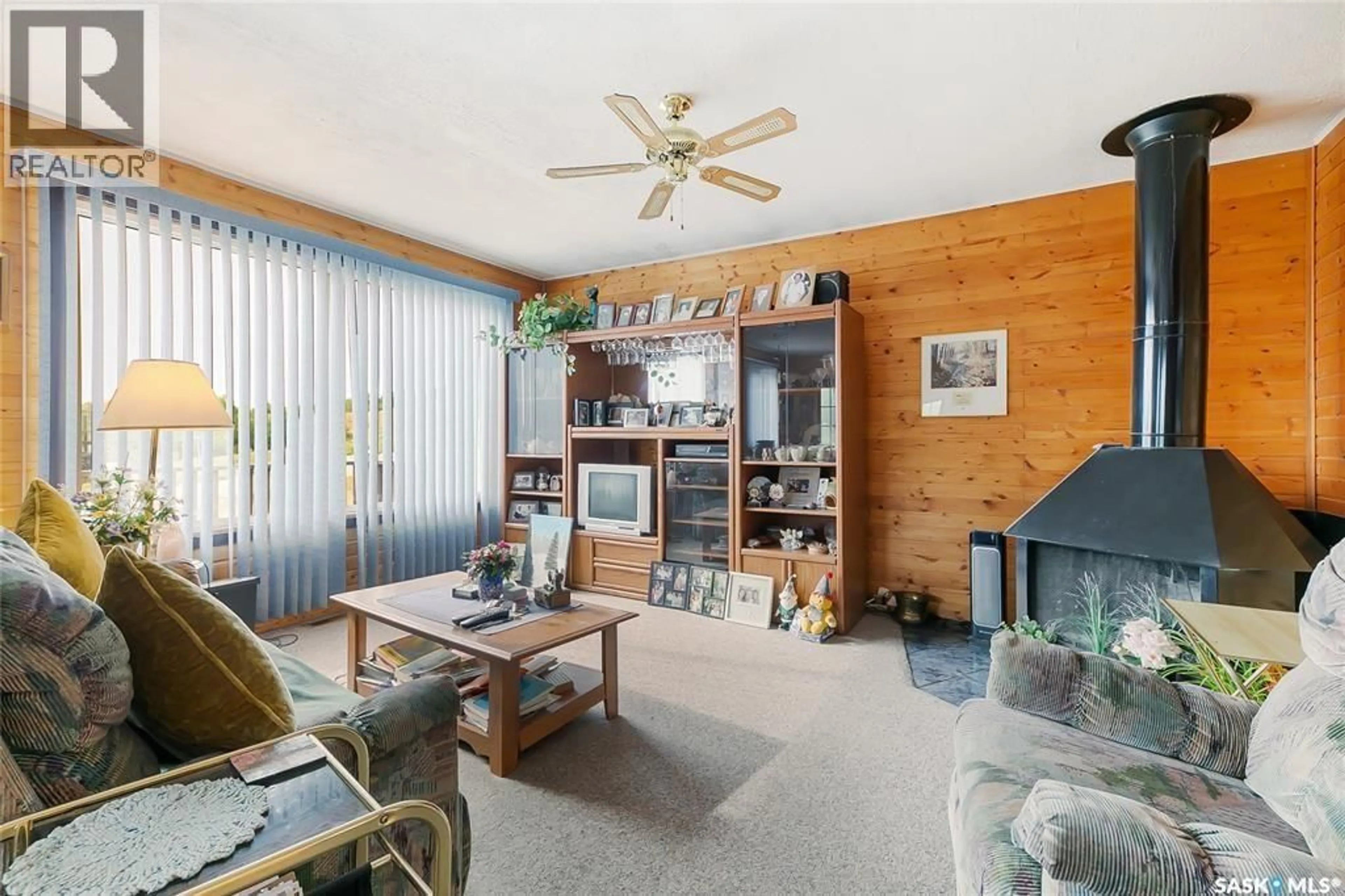 Living room with furniture, wood/laminate floor for 625 AURORA STREET, Saskatchewan Beach Saskatchewan S0G4L0