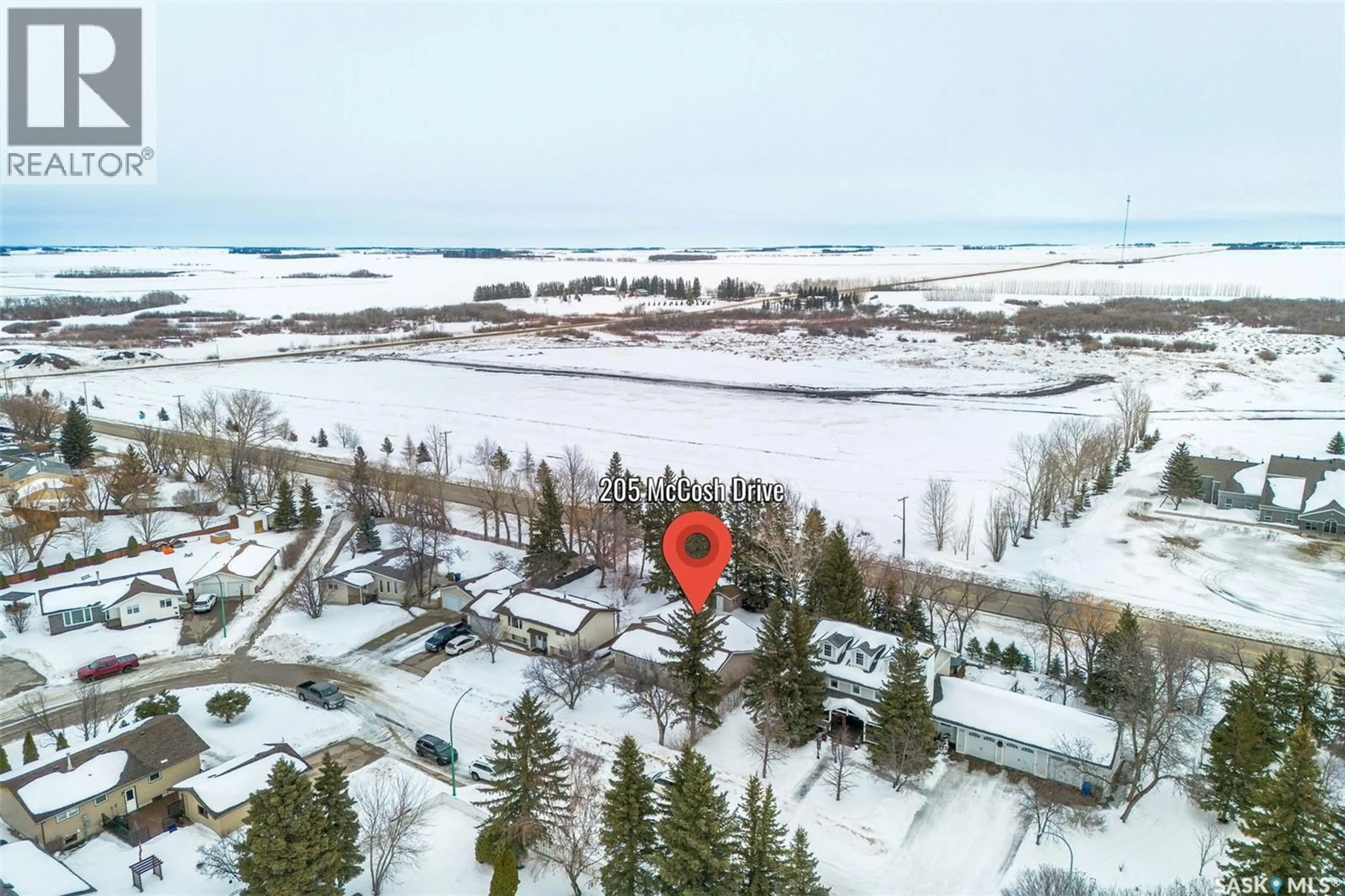 A pic from outside/outdoor area/front of a property/back of a property/a pic from drone, water/lake/river/ocean view for 205 MCCOSH DRIVE, Melfort Saskatchewan S0E1A0