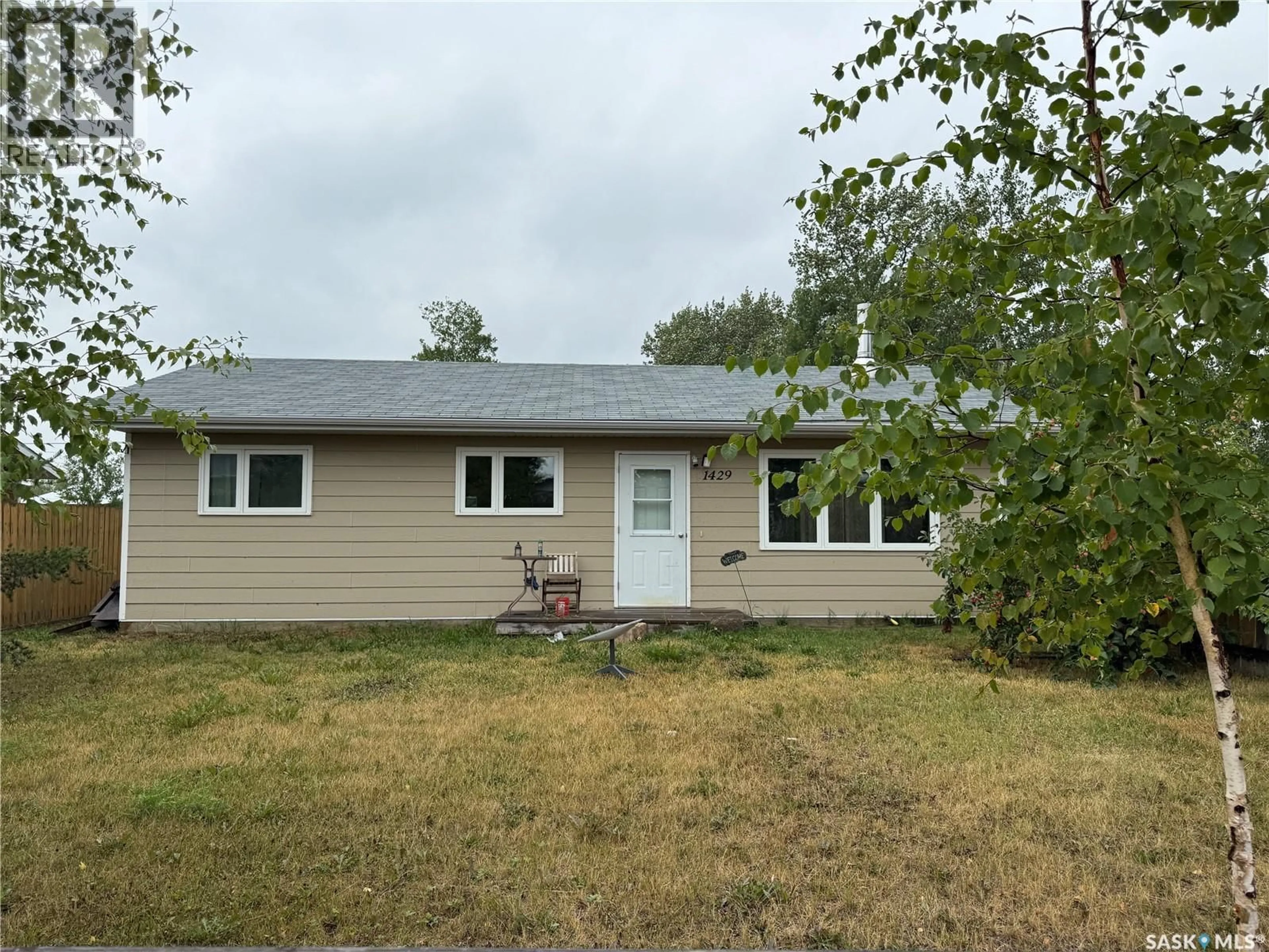 Home with vinyl exterior material, street for 1429 MORIN AVENUE, Buffalo Narrows Saskatchewan S0M0J0