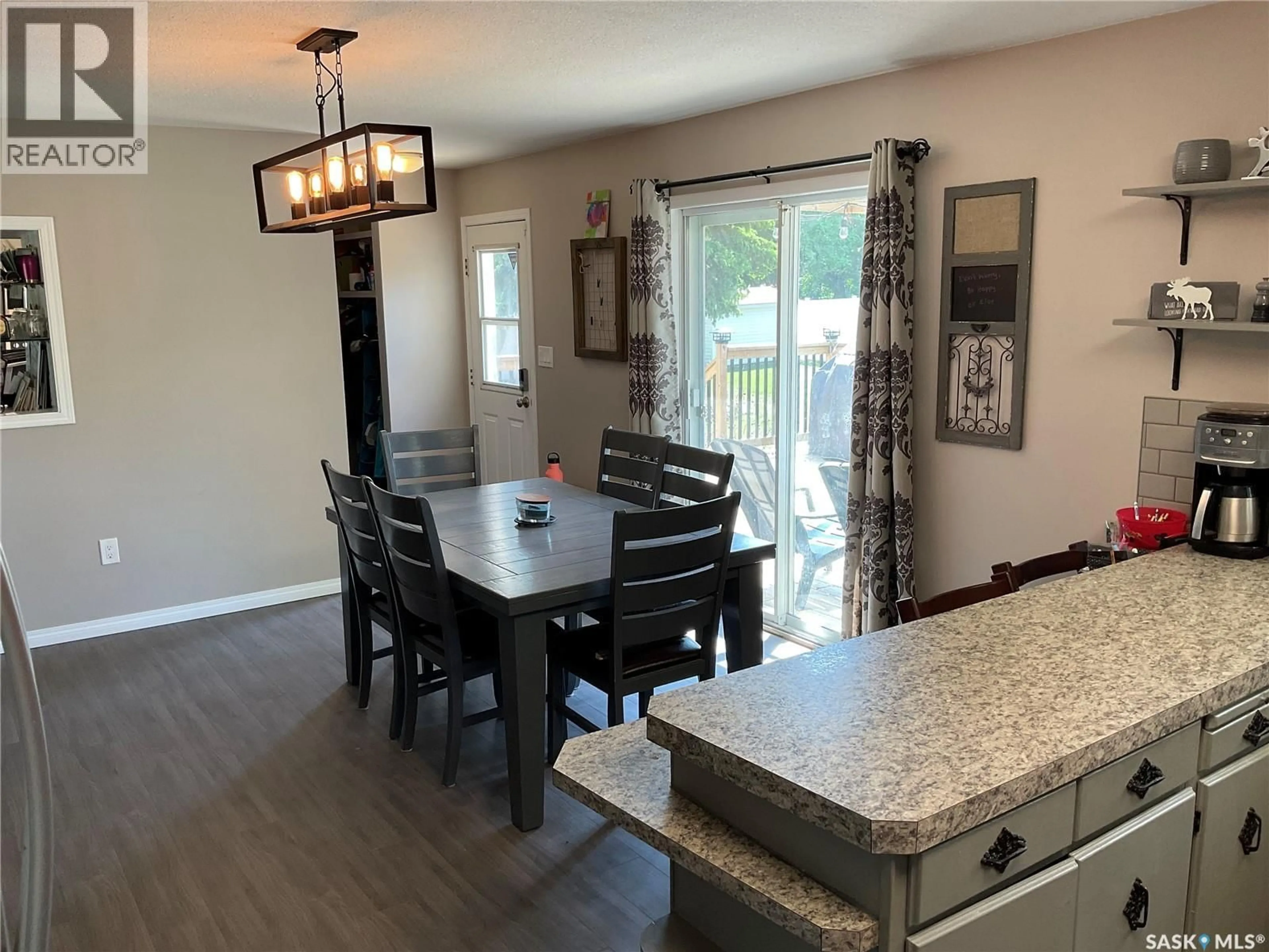 Open concept kitchen, wood/laminate floor for 600 6TH AVENUE, Cudworth Saskatchewan S0K1B0
