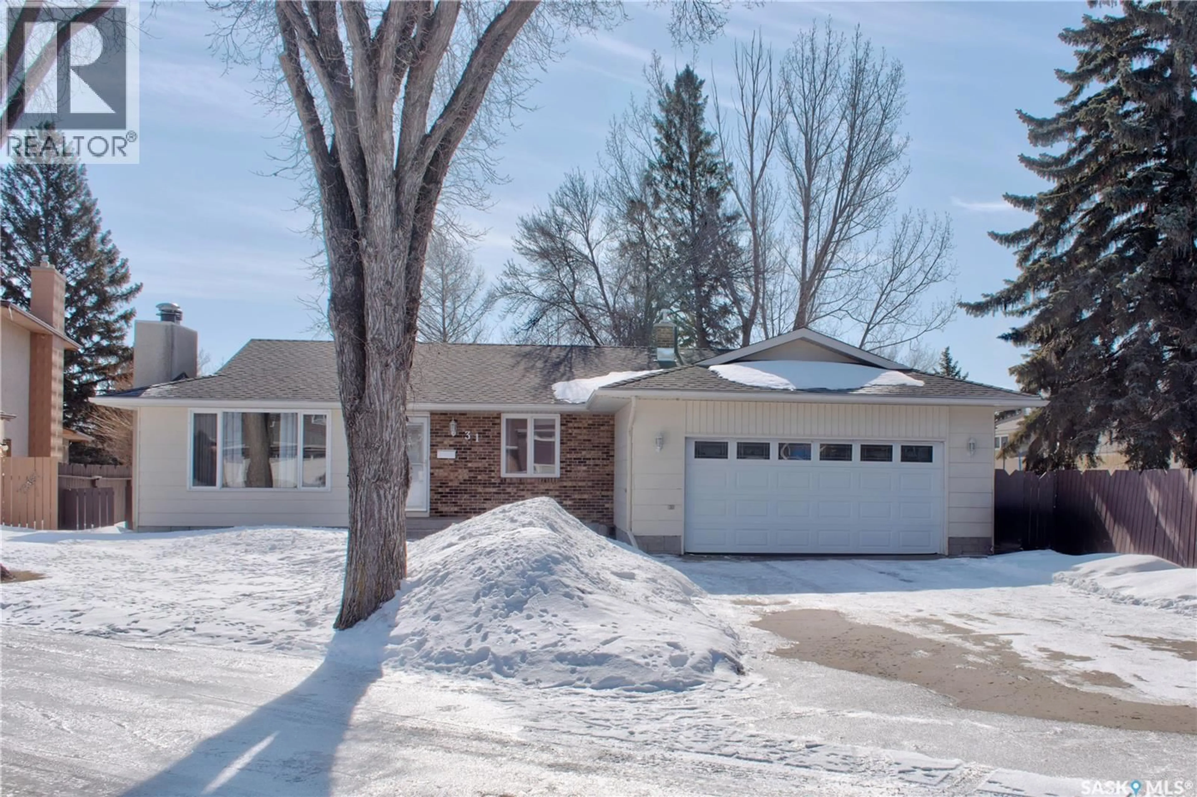 Home with brick exterior material, street for 31 CROSSLEY BAY, Regina Saskatchewan S4R7C2