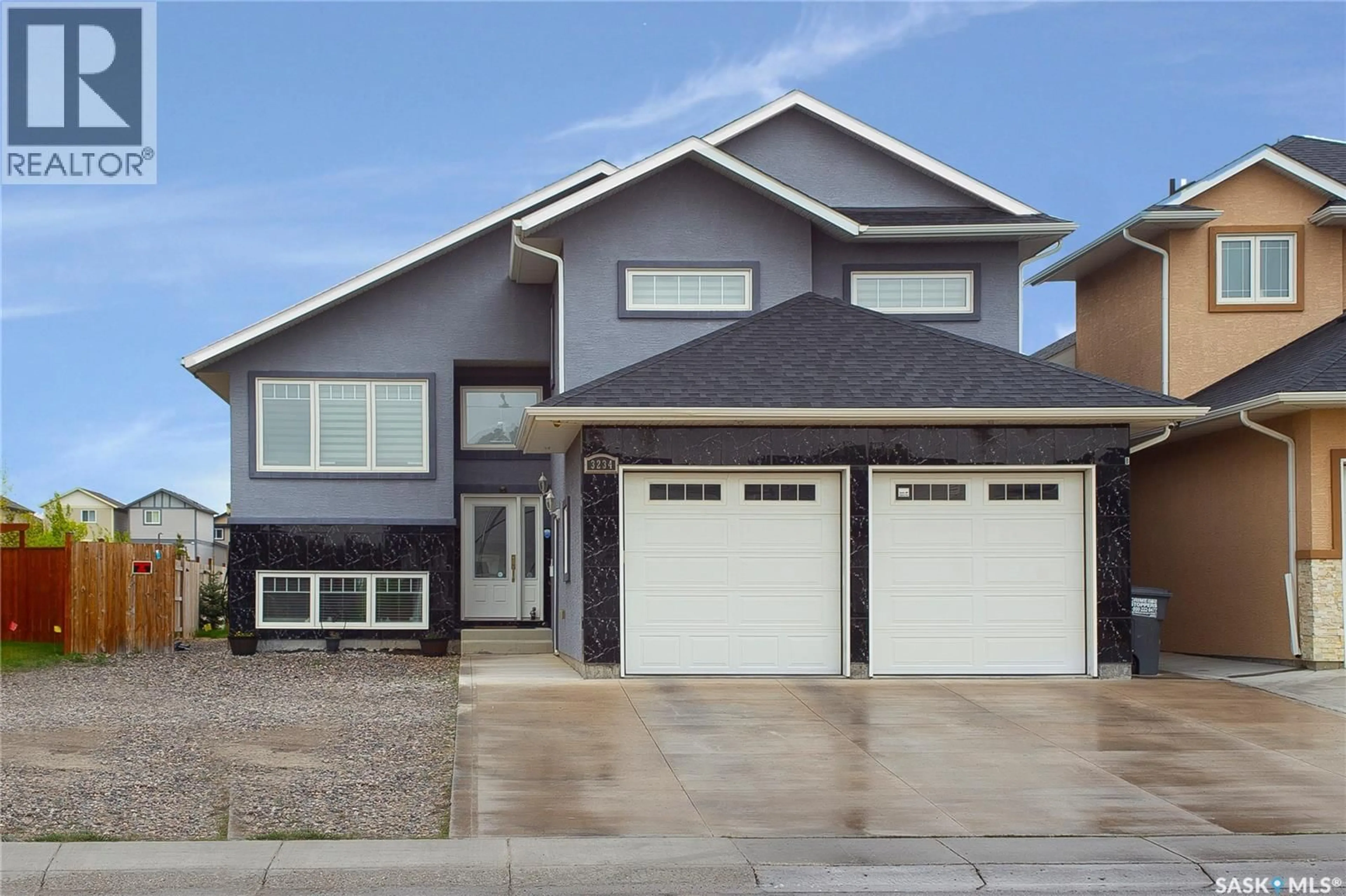 Home with vinyl exterior material, street for 3234 37TH STREET, Saskatoon Saskatchewan S7L7G3