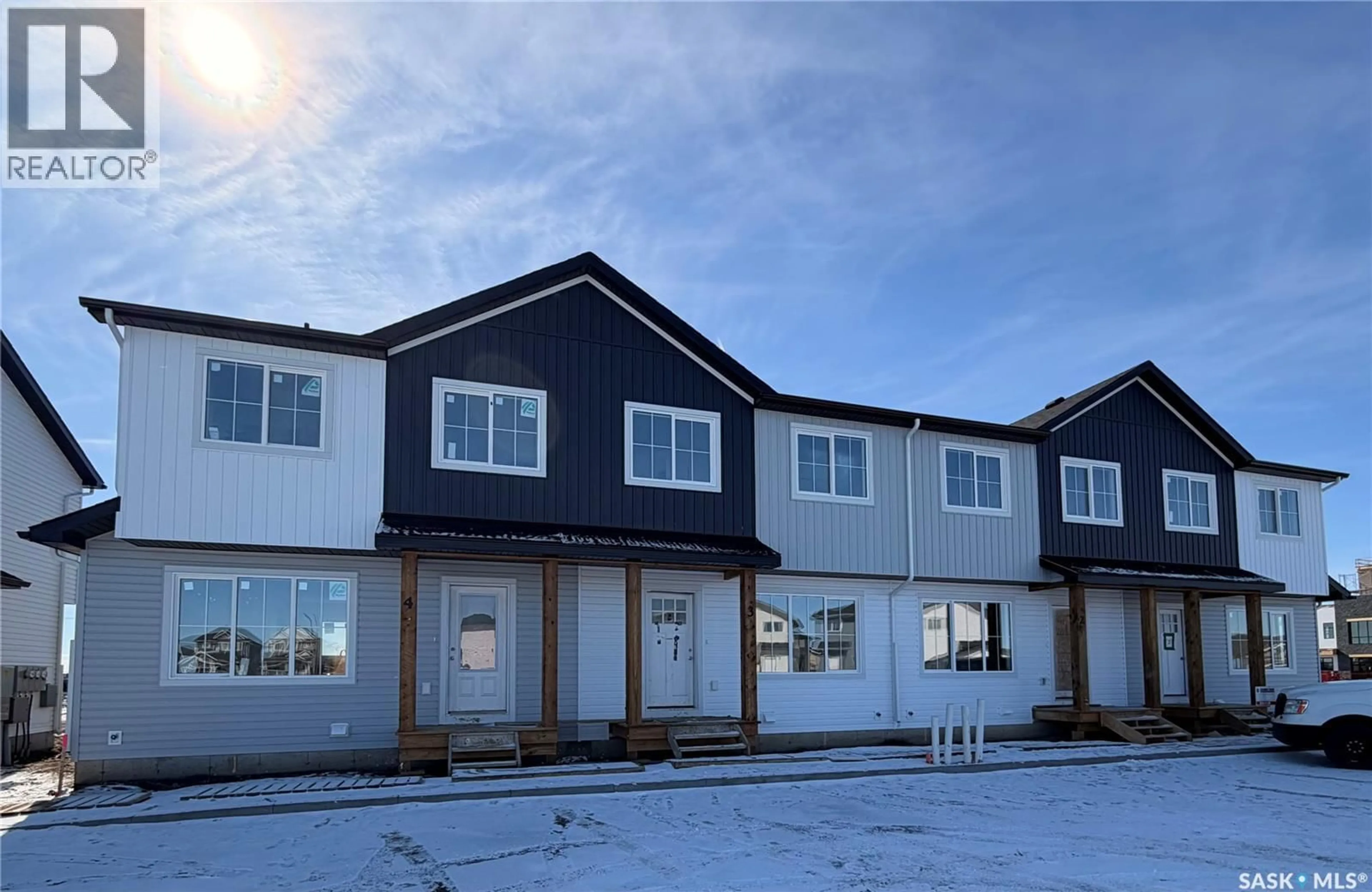 A pic from outside/outdoor area/front of a property/back of a property/a pic from drone, unknown for 4 101 MIROND ROAD, Martensville Saskatchewan S0K2T1