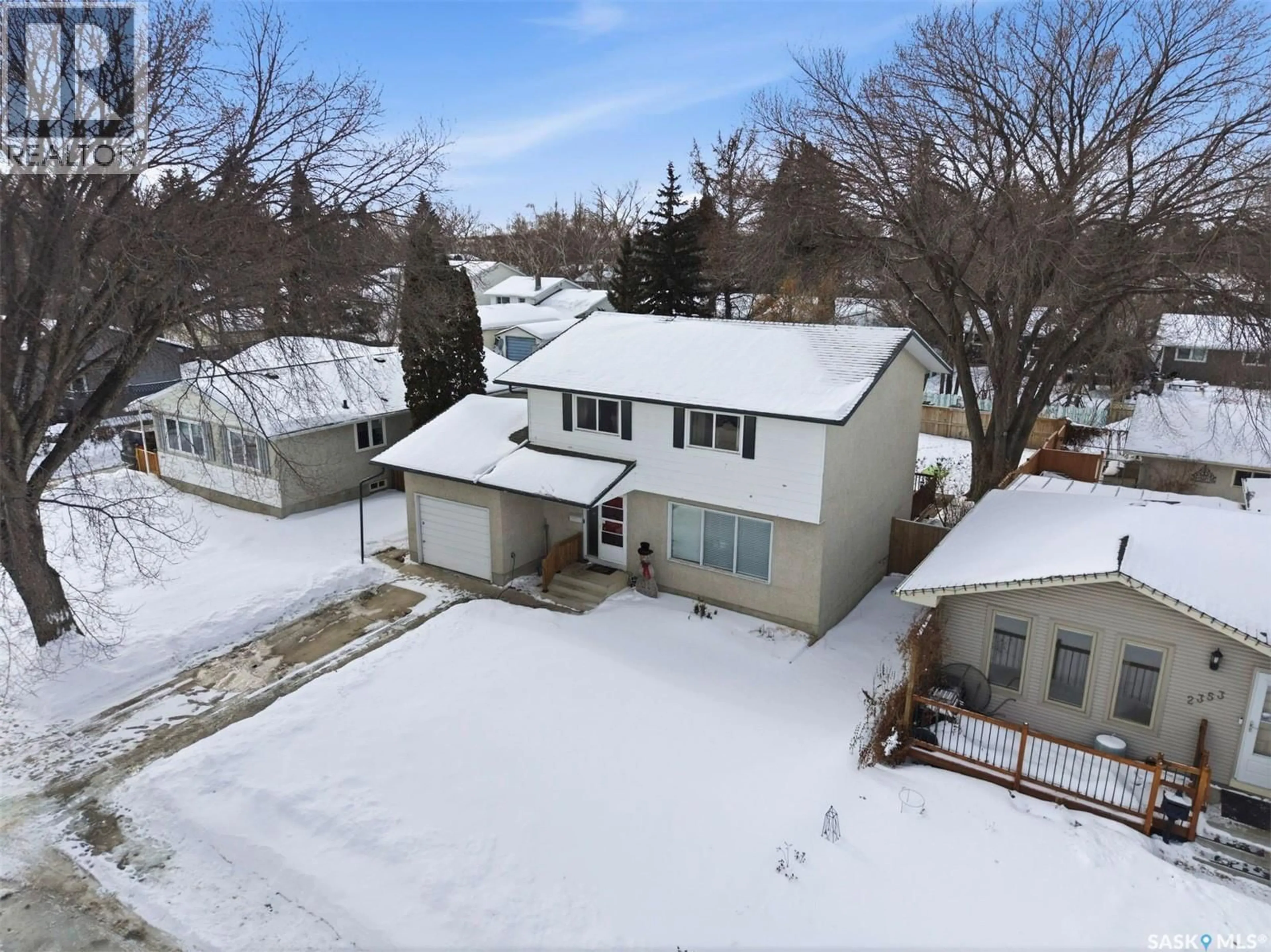 A pic from outside/outdoor area/front of a property/back of a property/a pic from drone, street for 2349 EASTHILL, Saskatoon Saskatchewan S7J3E4