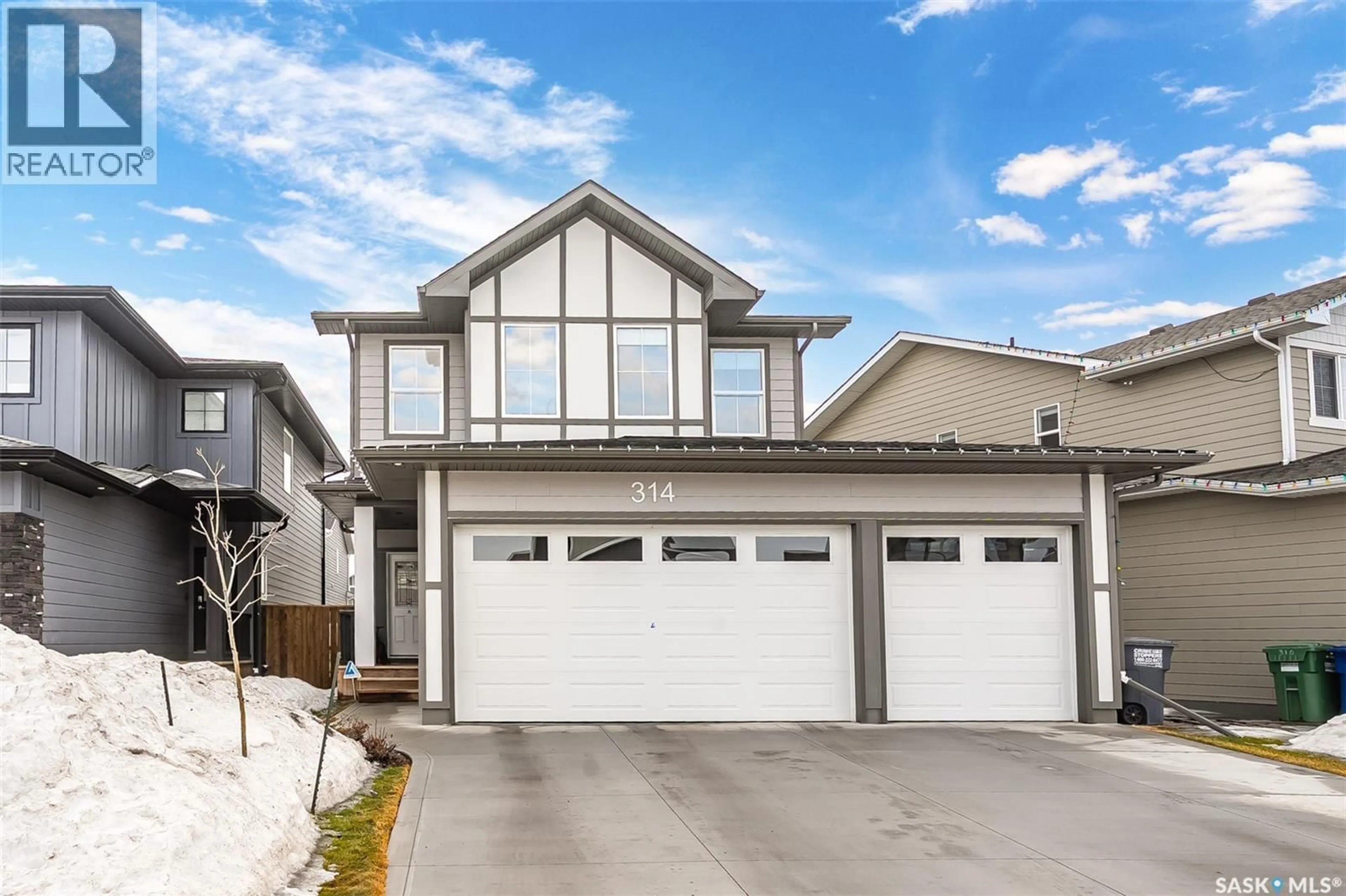 Home with vinyl exterior material, street for 314 KEITH UNION, Saskatoon Saskatchewan S7V0X8