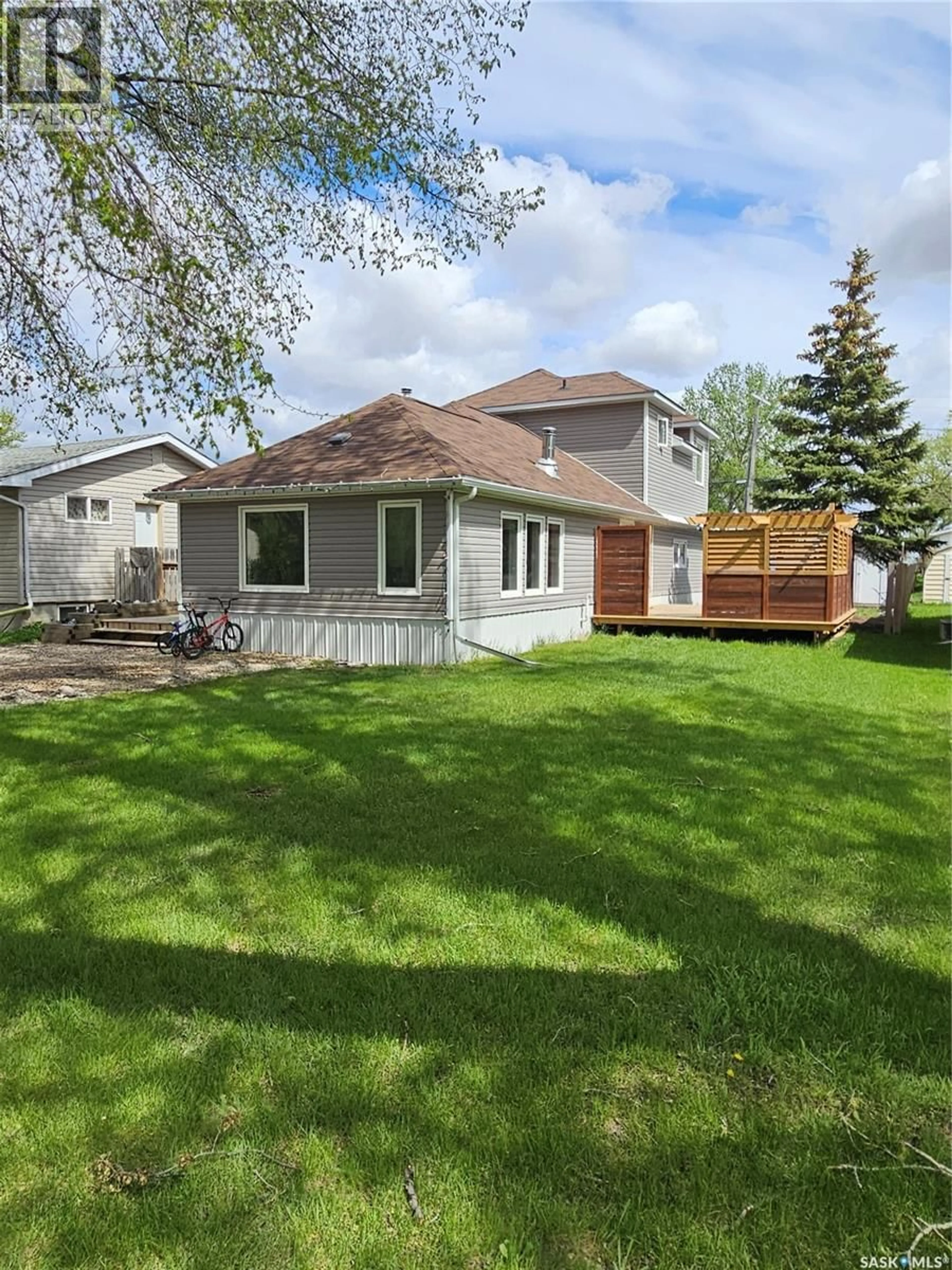 Home with vinyl exterior material, street for 117 2ND STREET, Carlyle Saskatchewan S0C0R0